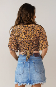 Leopard print Tree of Life wrap top in size small. Wonderful worn condition. Like new available at Wilson Avenue 