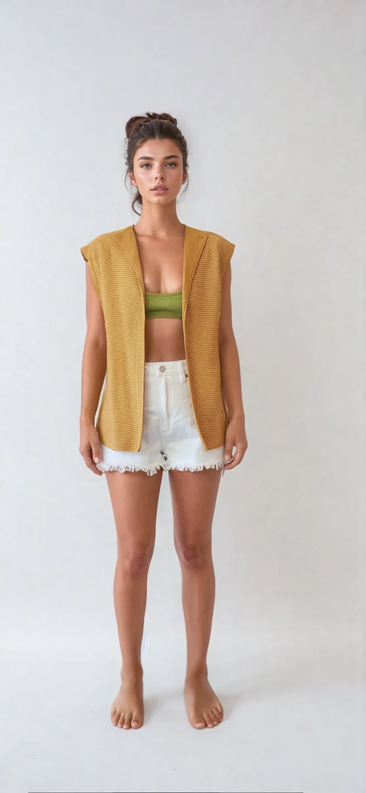 Front view of model wearing Vintage late 60's early 70's vintage, Ara Modell vest in mustard. Relaxed open front style vest.
