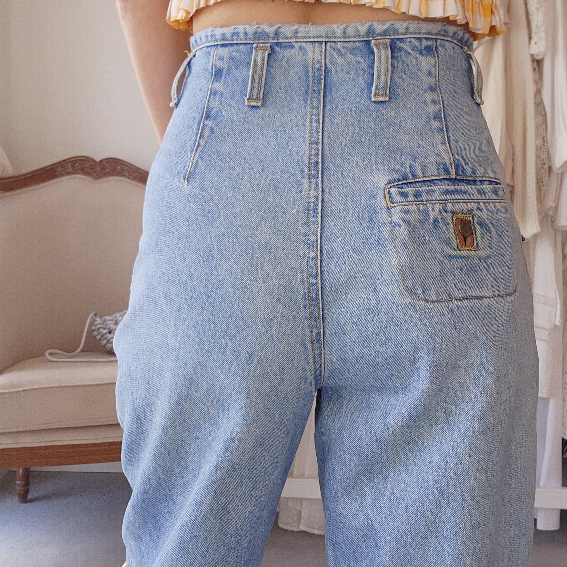 80's 90's Calvin Klein jeans. High waisted blue denim, with a pleated front in a Mum style size 9-10