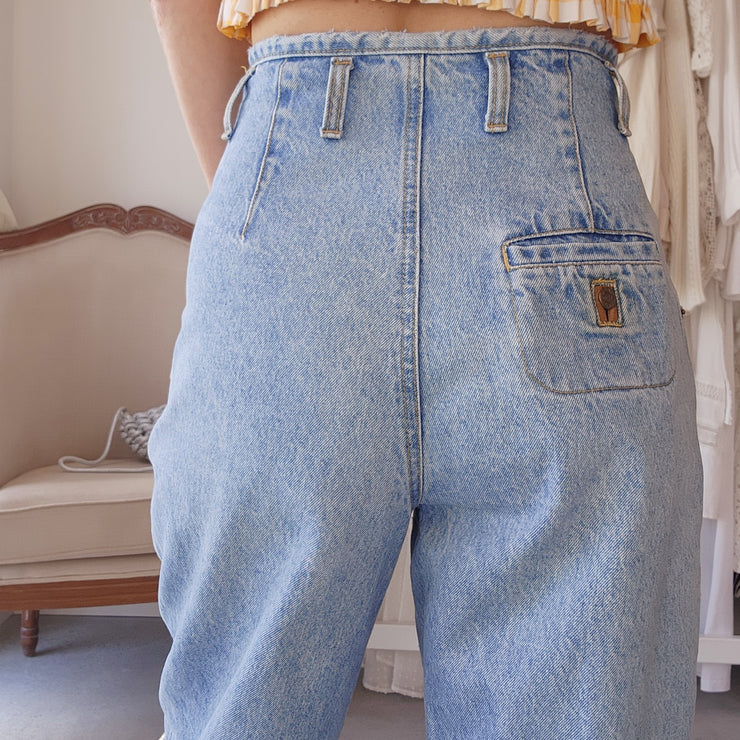 80's 90's Calvin Klein jeans. High waisted blue denim, with a pleated front in a Mum style size 9-10