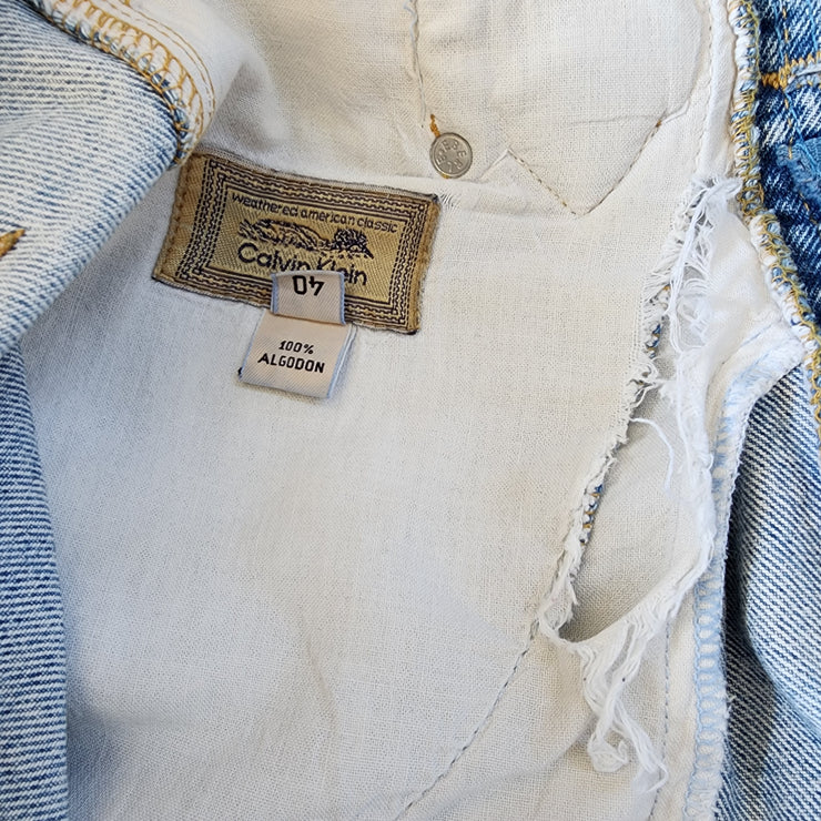 80's 90's Calvin Klein jeans. High waisted blue denim, with a pleated front in a Mum style size 9-10