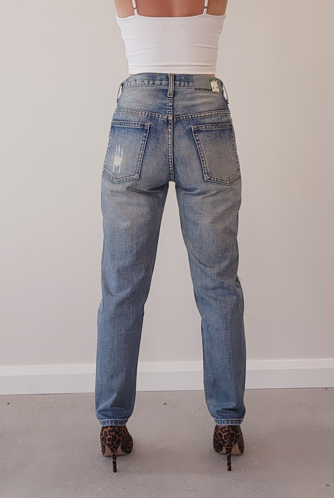 Ziggy denim jeans. Medium wash distressed denim jeans