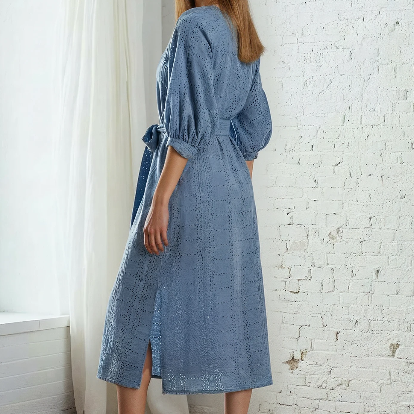 Model showing the back view of the Zoe Kratzmann Motto dress, showing the embroidered details.