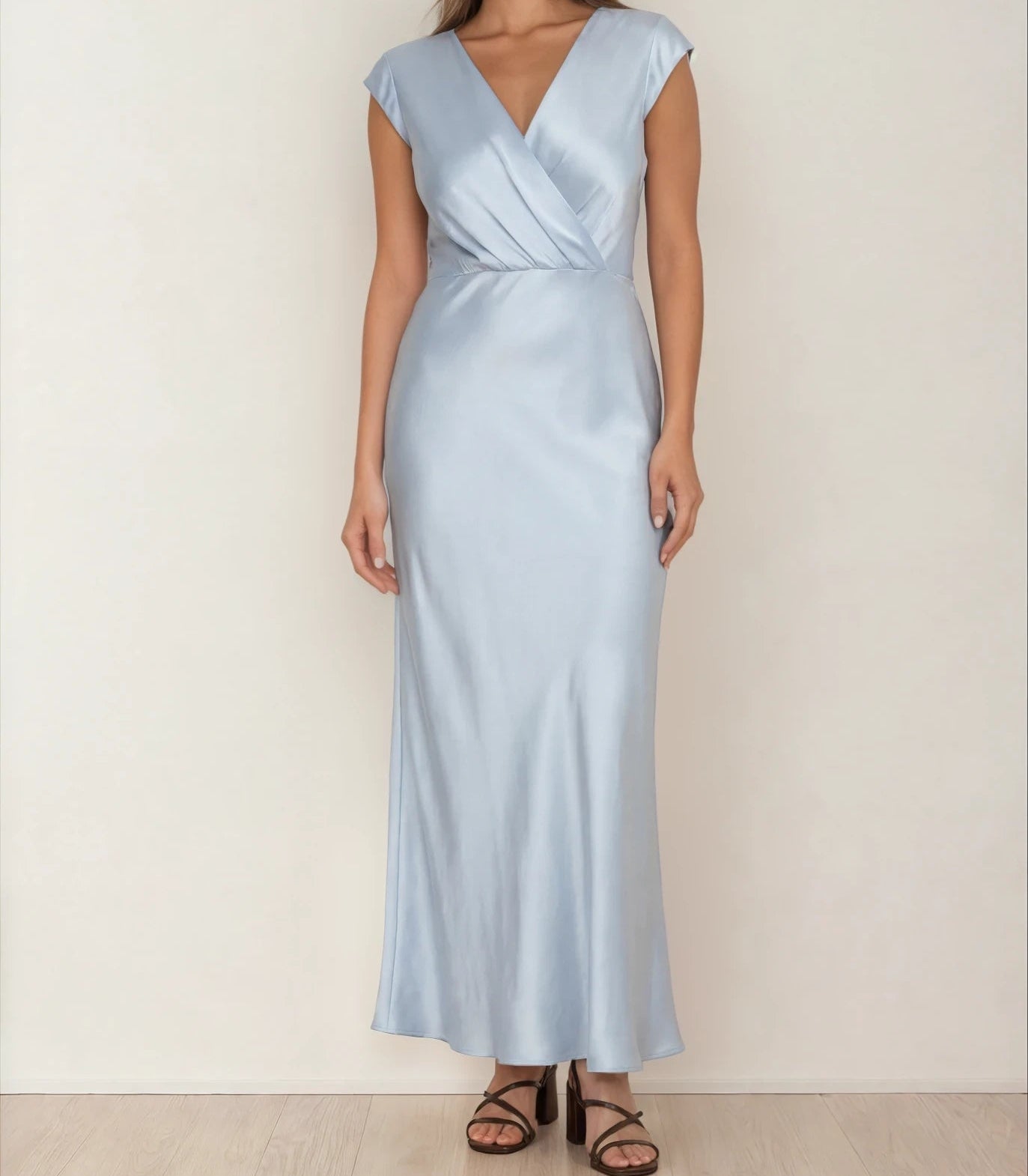 Model wearing the Bec & Bridge Moon Dance Maxi in Blue, showing the crossover front and soft silhouette