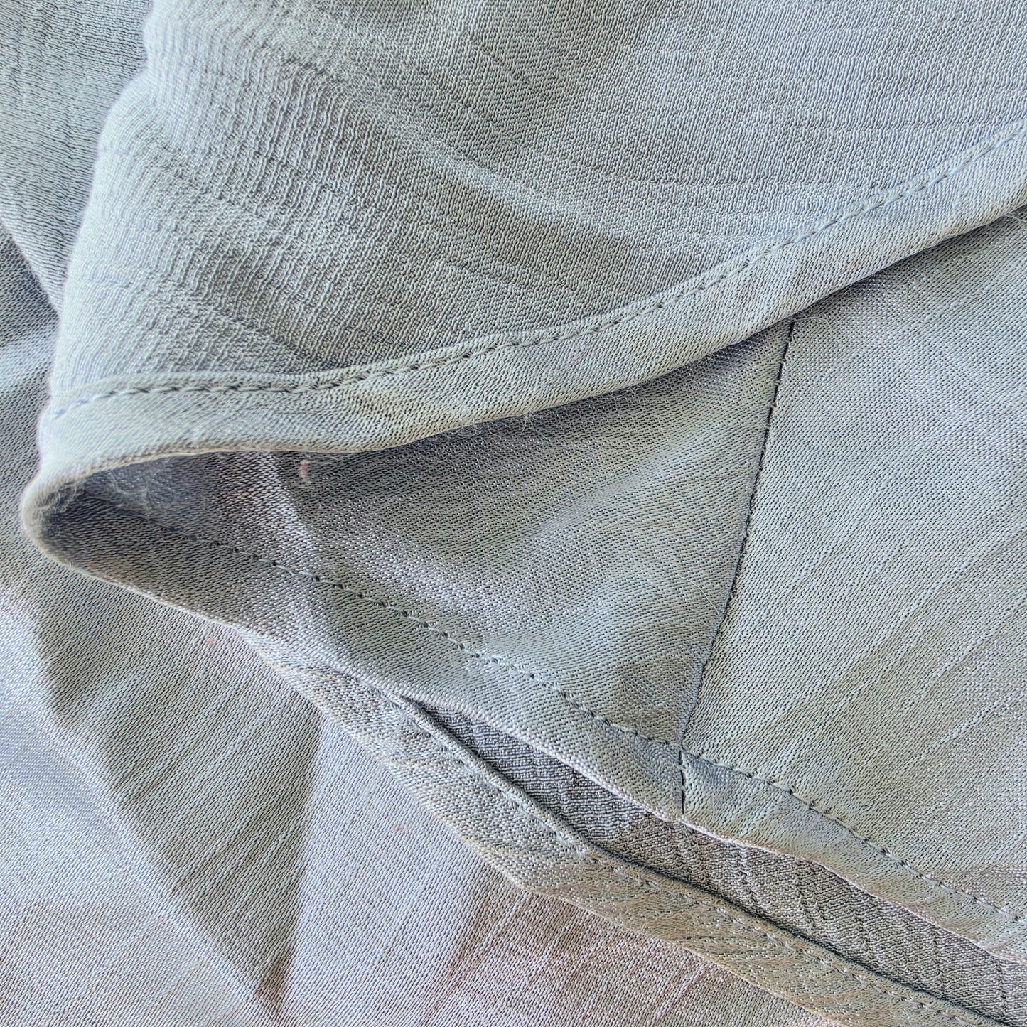 Close-up of the hemline on the Bec & Bridge Moon Dance Maxi Dress showing the fluffing of the fabric.