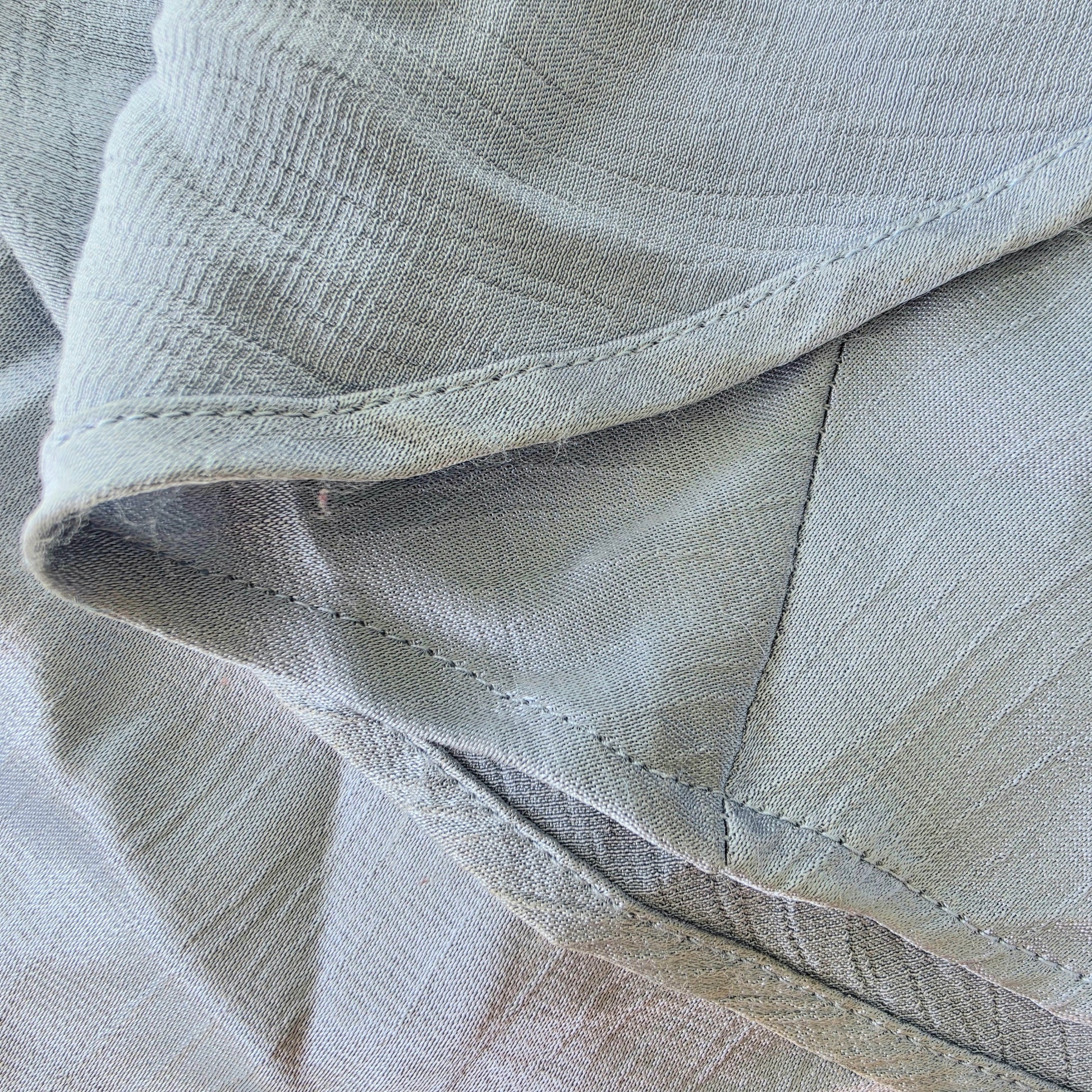 Close-up of the hemline on the Bec & Bridge Moon Dance Maxi Dress showing the fluffing of the fabric.
