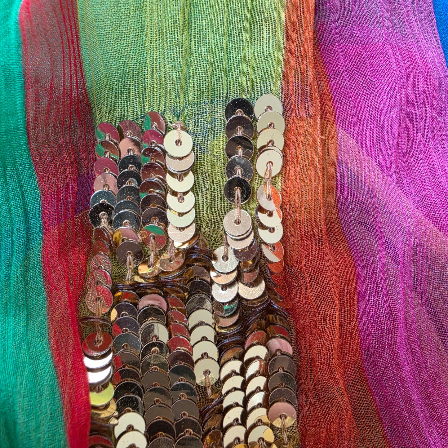 Close up image of the Bonita Collective sequin skirt, showing a line of missing gold sequins.
