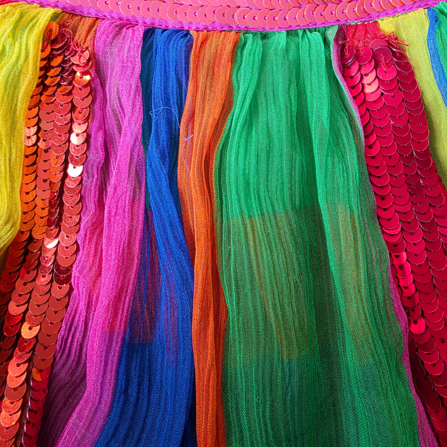Bright multicolour tiered panels of Bonita Collective Viviana skirt with sequin waistband