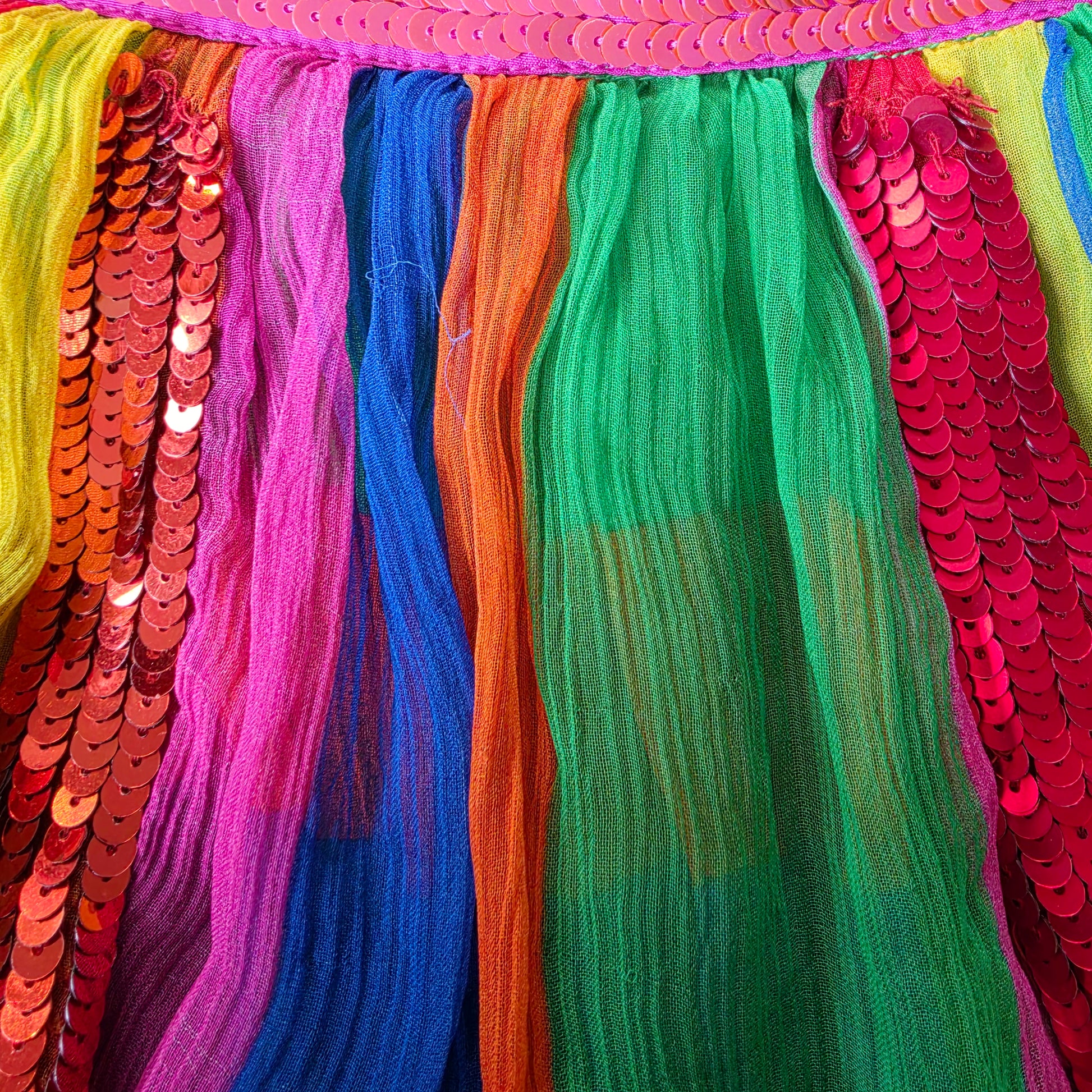 Bright multicolour tiered panels of Bonita Collective Viviana skirt with sequin waistband