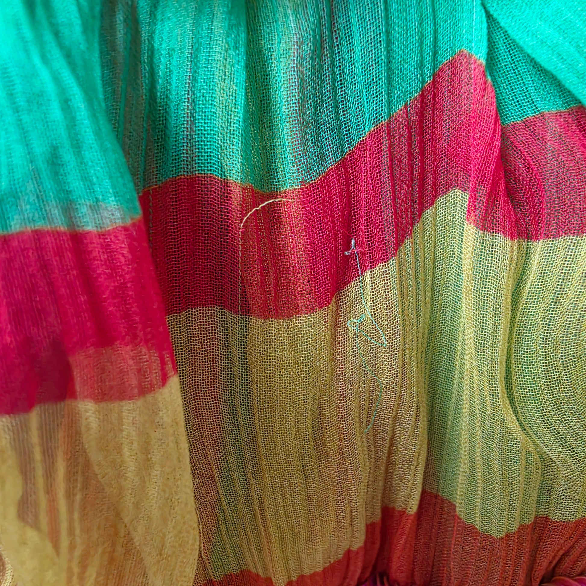 Close-up showing small fabric pull on Bonita Collective Viviana tiered skirt