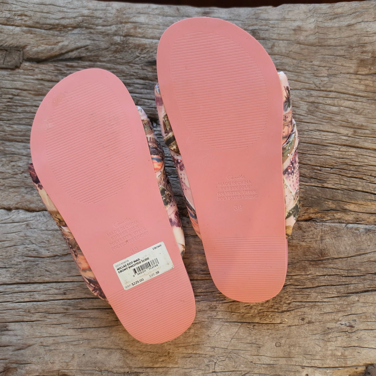 Outer sole of Camilla slides showing light shop floor scuffing from try-on wear