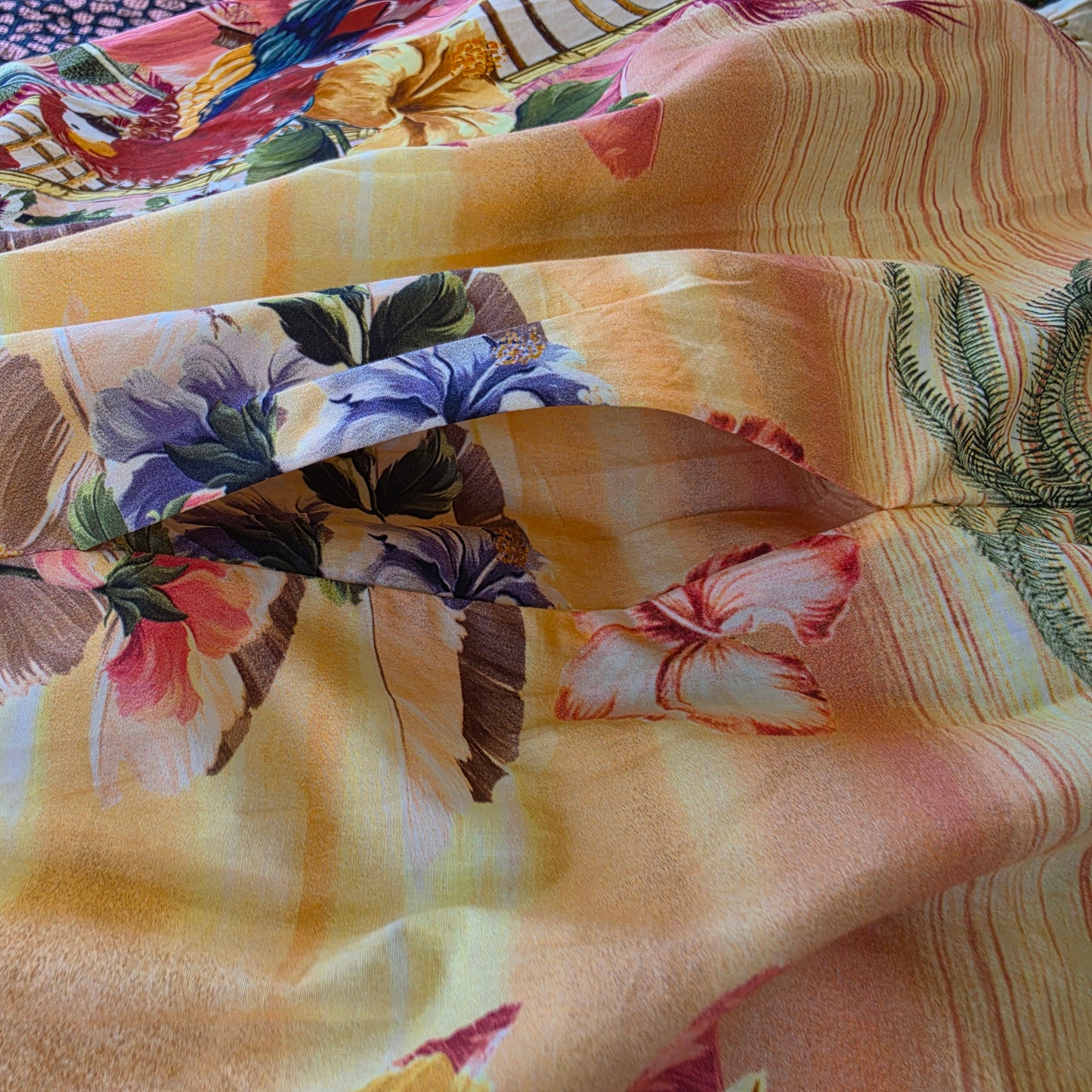 Close up view of the pocket on the CAMILLA x The White Lotus long dress.