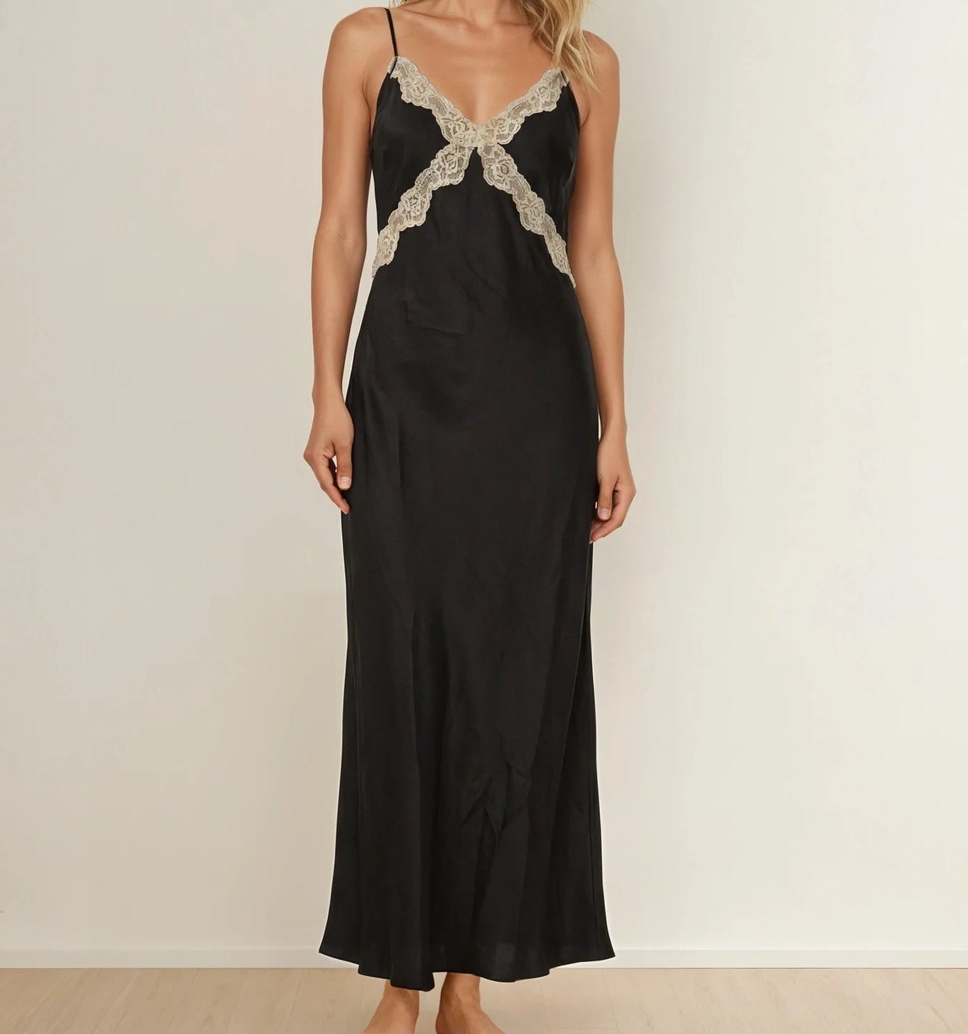 Front view of model wearing the Chloe & Lola lace slip dress, showing the beige lace trim and midi length.