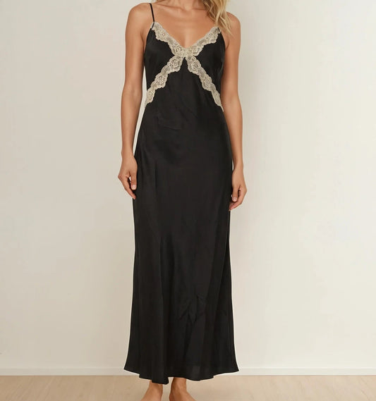 Front view of model wearing the Chloe & Lola lace slip dress, showing the beige lace trim and midi length.