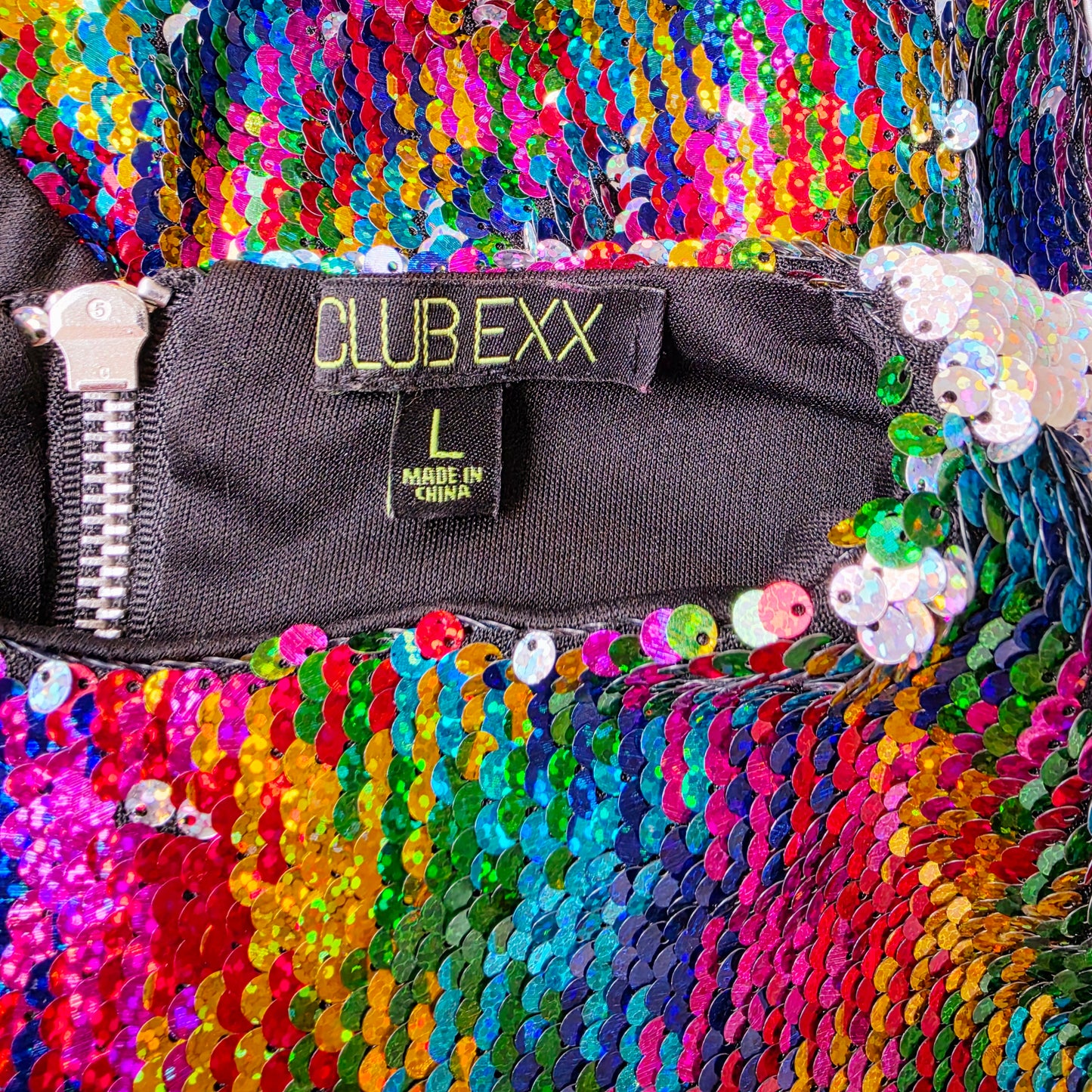 Club Exx size large label inside multicolour sequin bodysuit with black lining