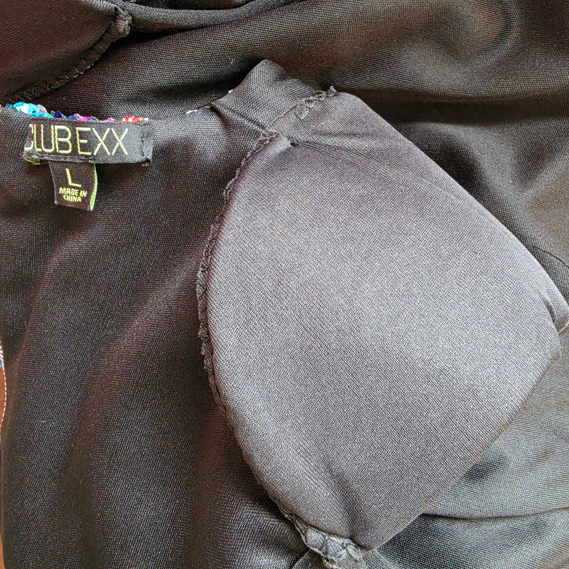 Interior view of black lining and shoulder pads
