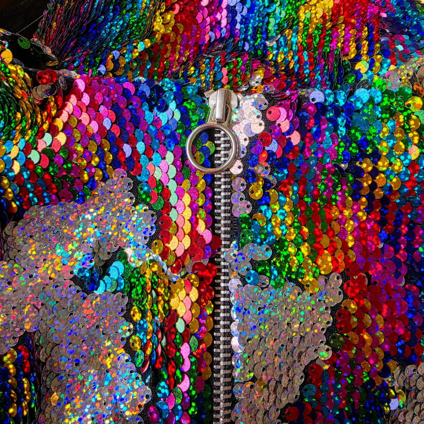 Multicolour sequin bodysuit with exposed silver zip closure and circular pull detail