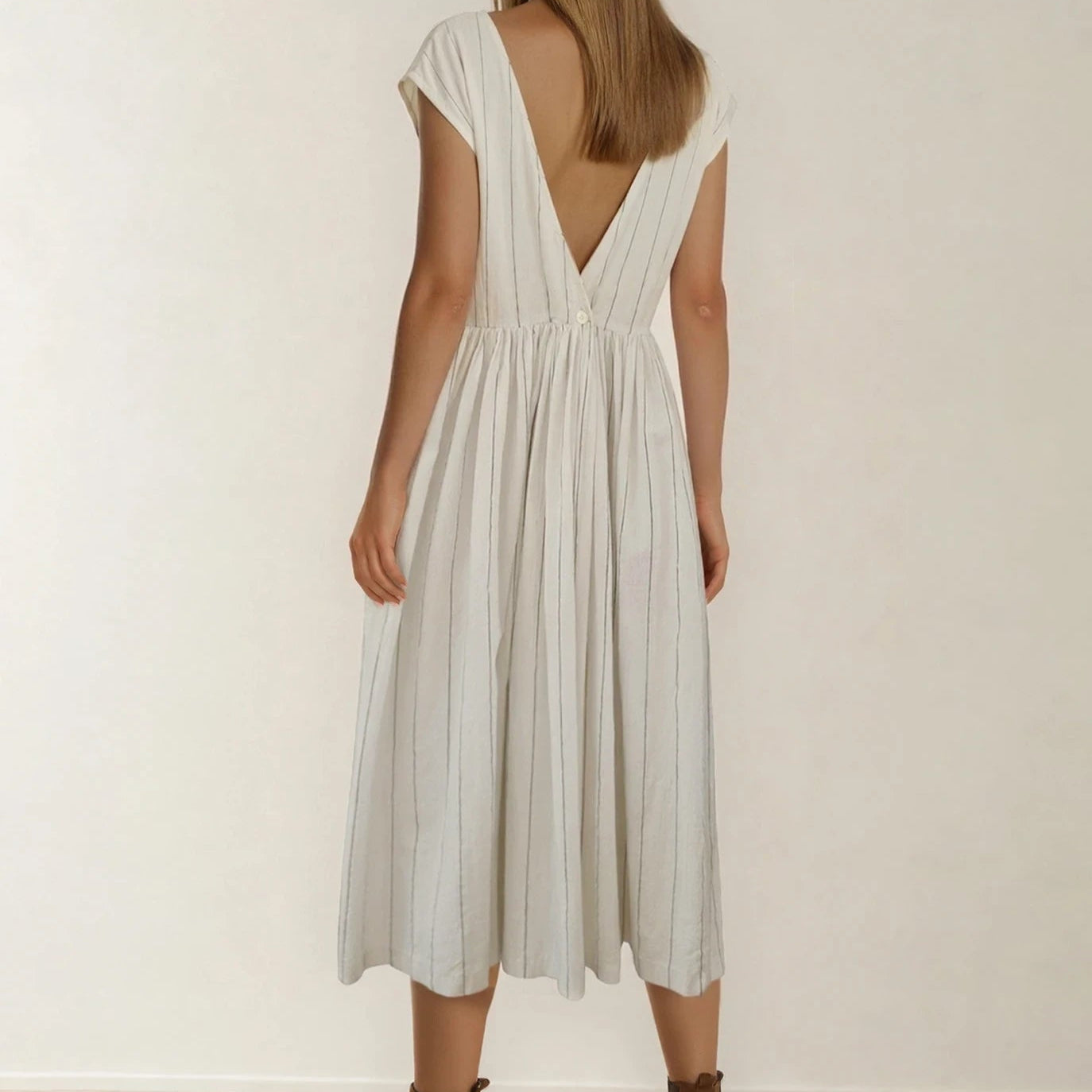 Back view of vintage Country Road midi dress featuring a low V back and gathered waist
