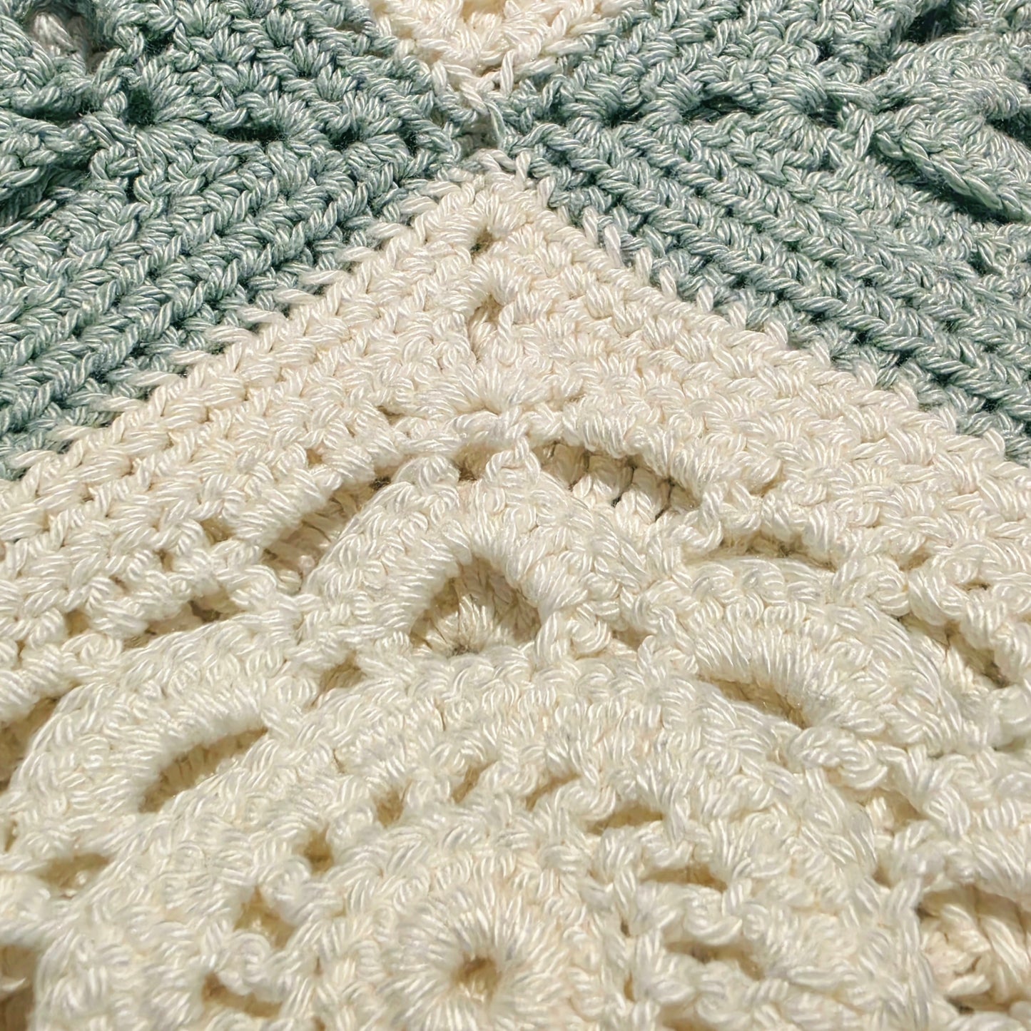 A close up view of the style and quality of the weave on the crochet fringe dress.