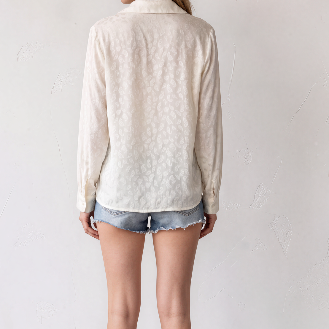 Back view of the vintage Equorian Heritage ivory paisley jacquard shirt featuring a subtle woven paisley pattern.