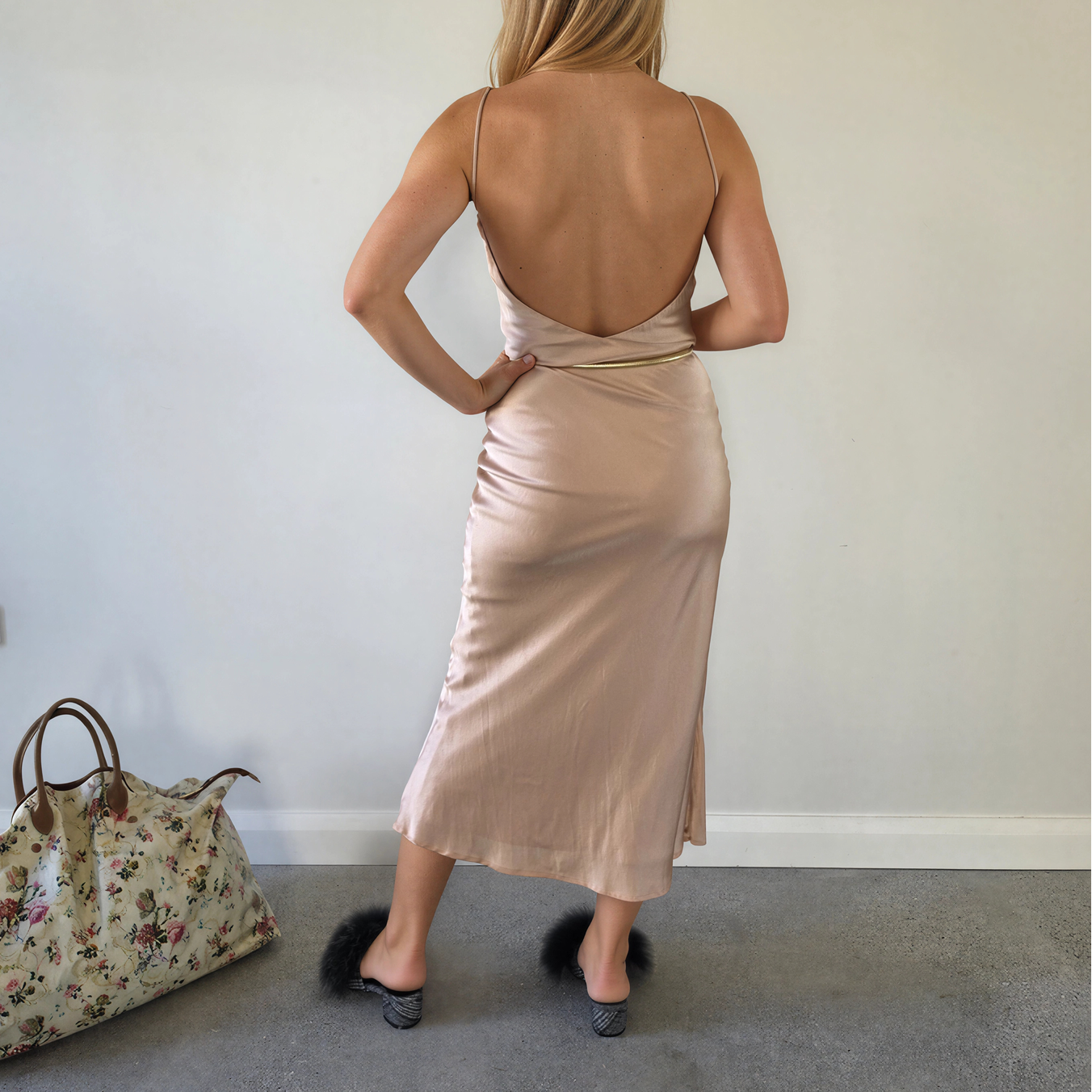 Back view of woman wearing the Hansen & Gretel Slip dress showing the soft drape and low back.