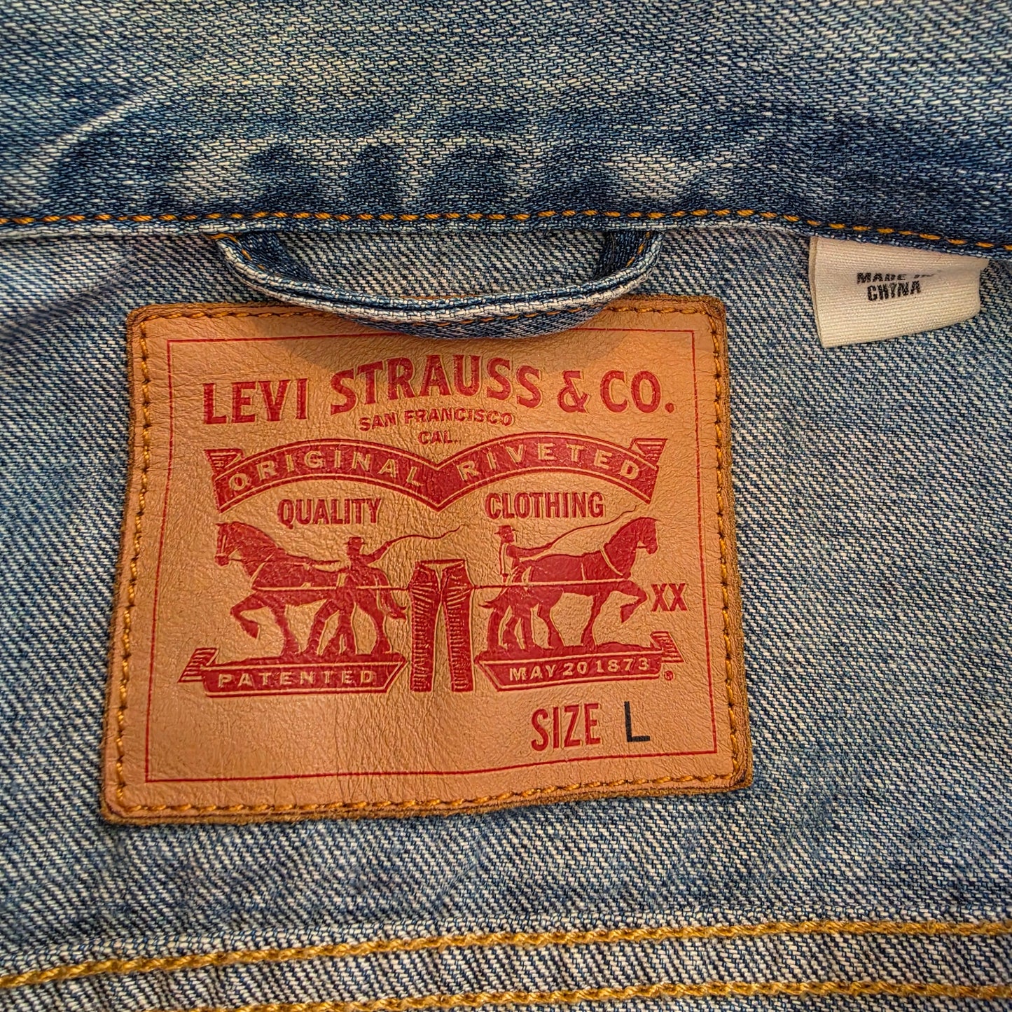Levi Strauss & Co leather patch on inside of denim trucker jacket, size L