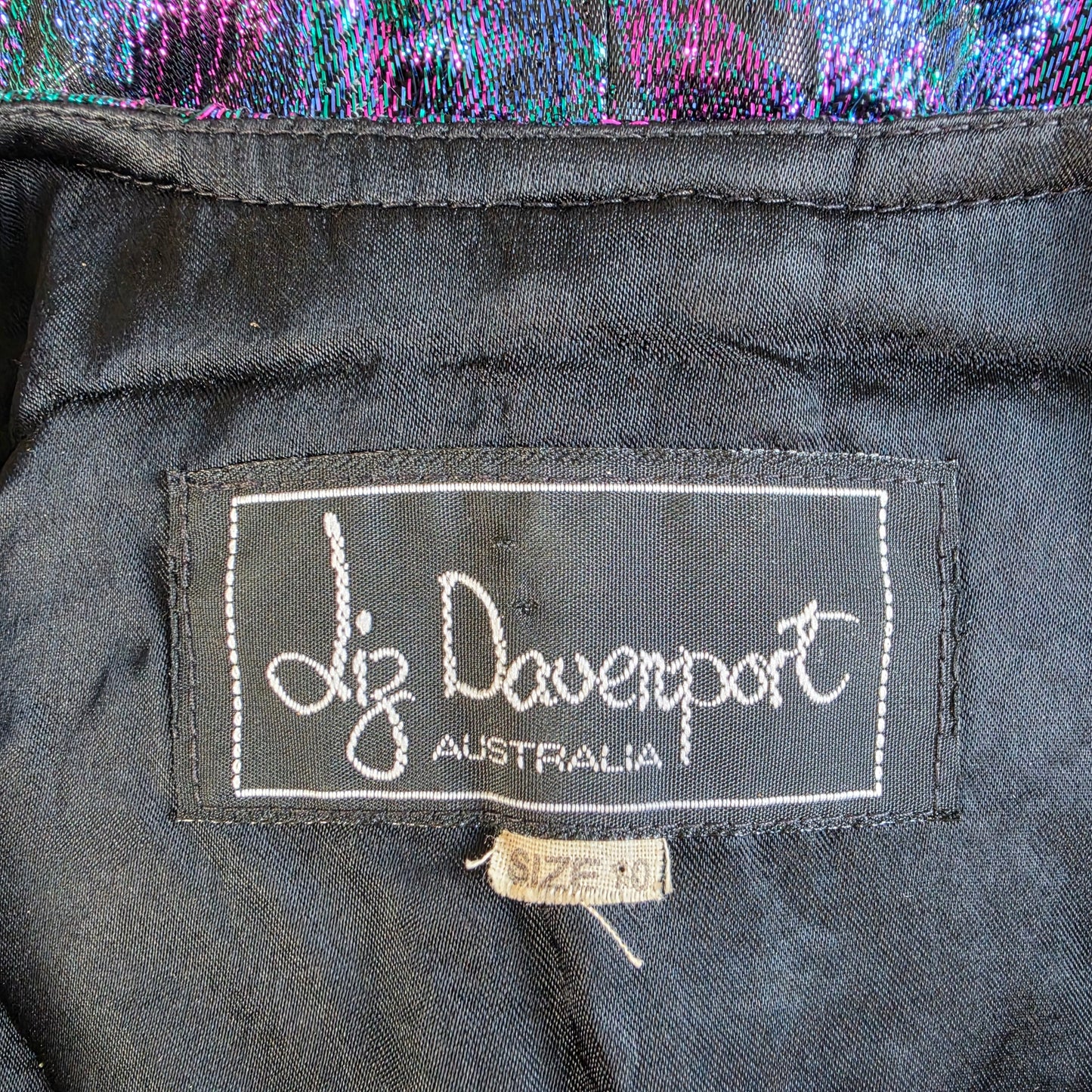 Liz Davenport vintage label inside blazer showing brand and size details.