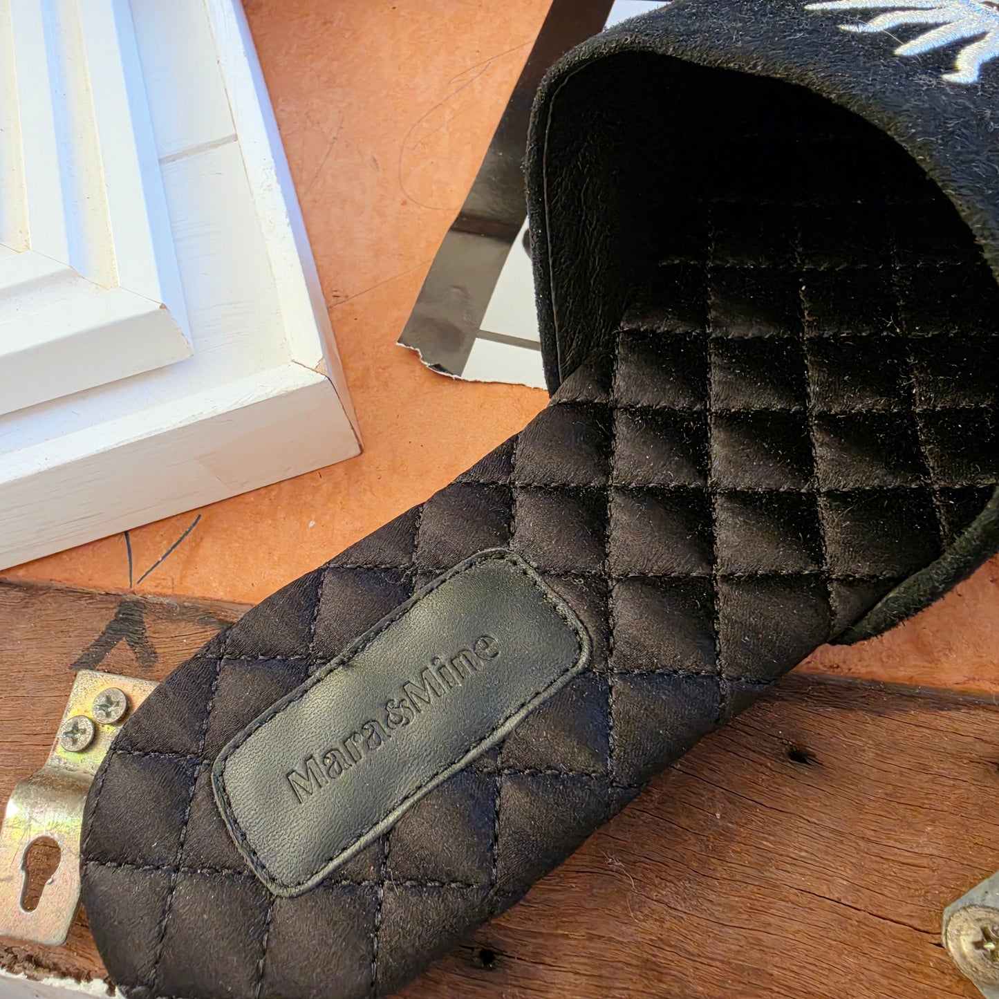 Mara and Mine branded quilted footbed detail Estrella slides