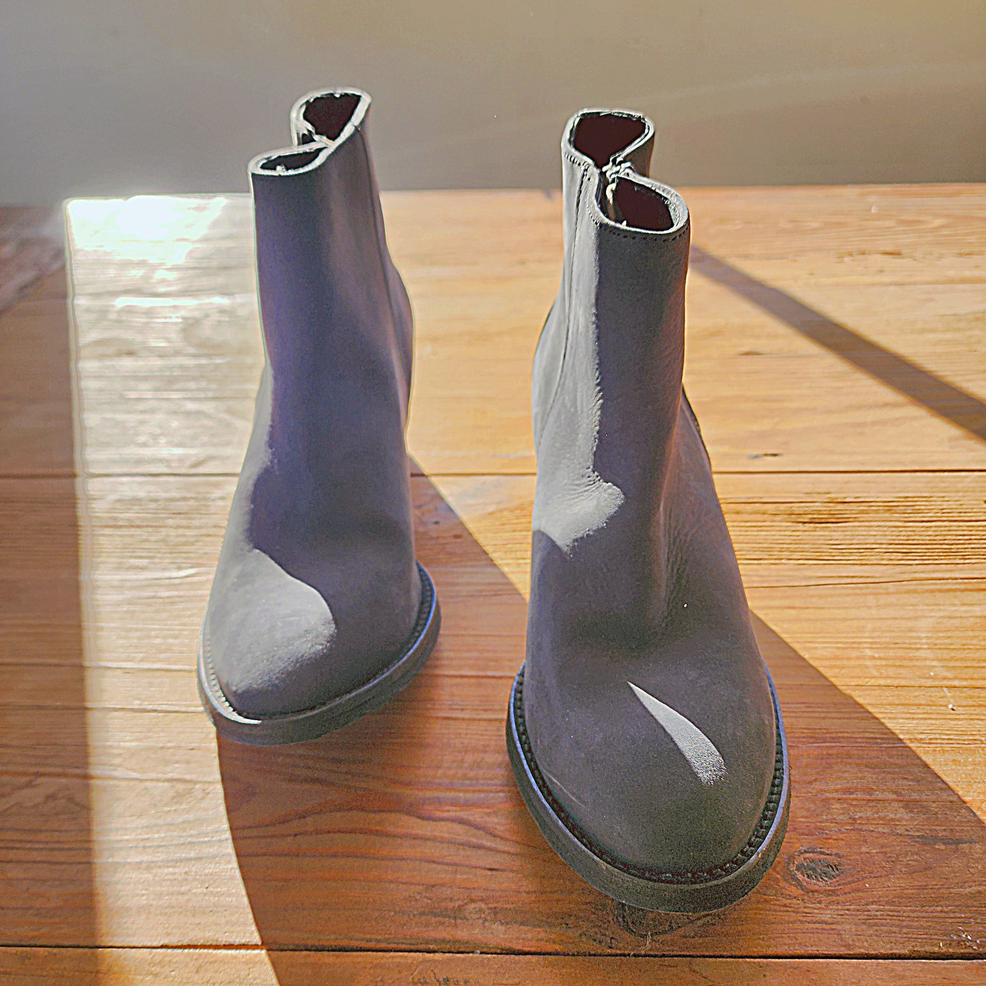 Front view of the Maya McQueen grey suede ankle boots in size 38, showing the smooth suede and classic boot shape.
