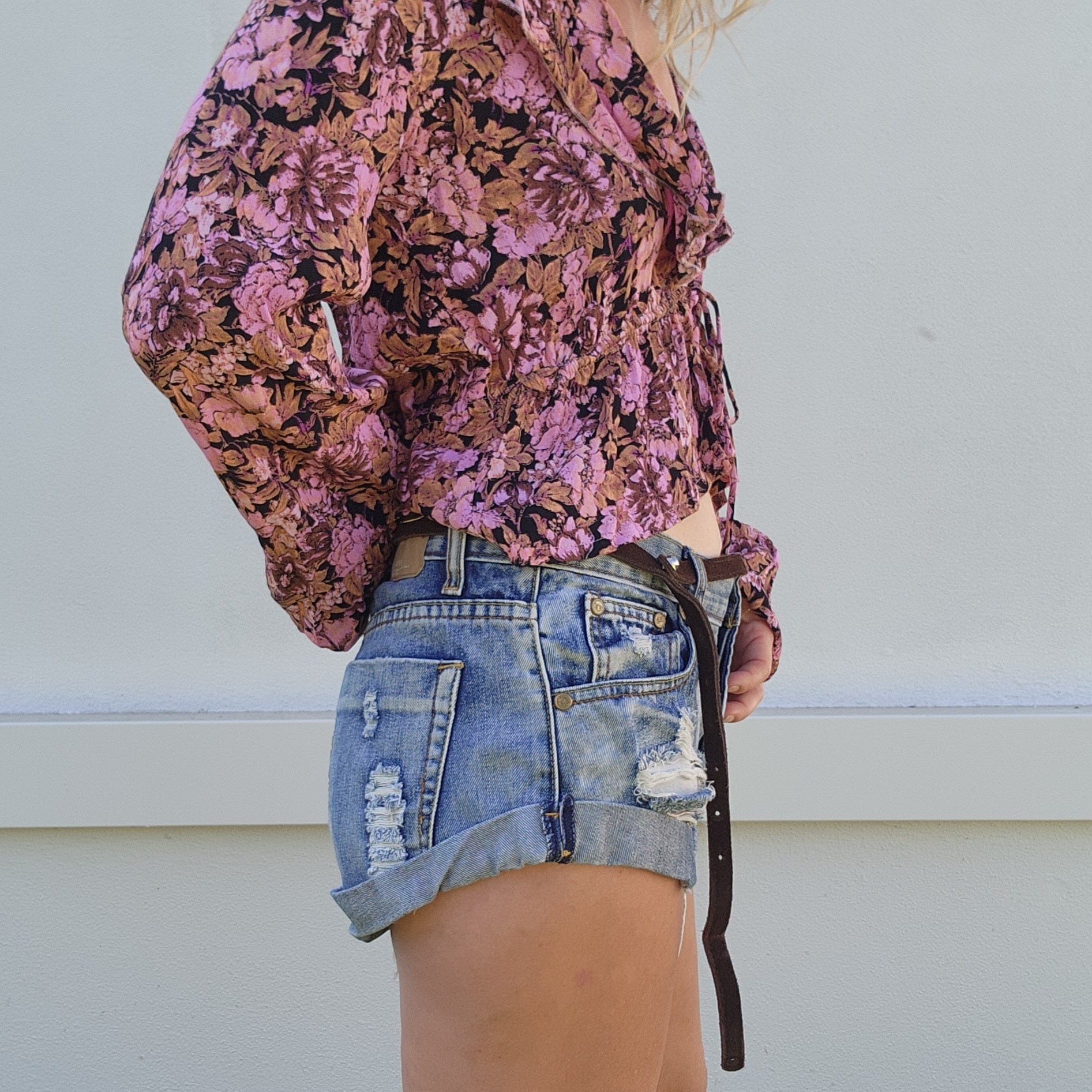 Low waisted One Teaspoon denim Bandits. Distressed western style mini shorts in a size 9