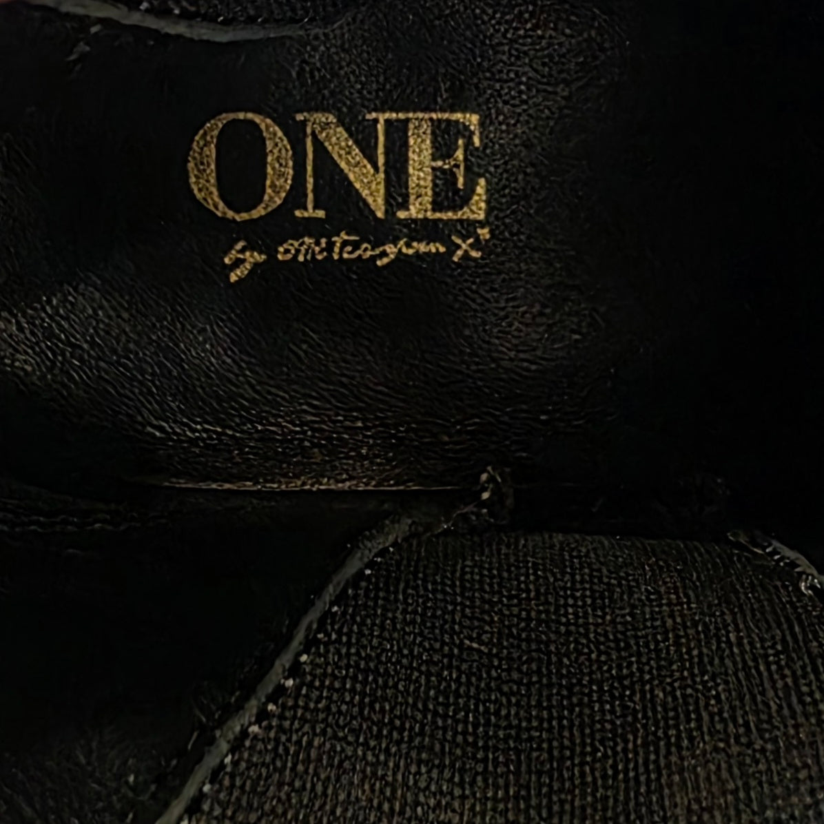 Close up view of the One Teaspoon brand inside the suede boot.