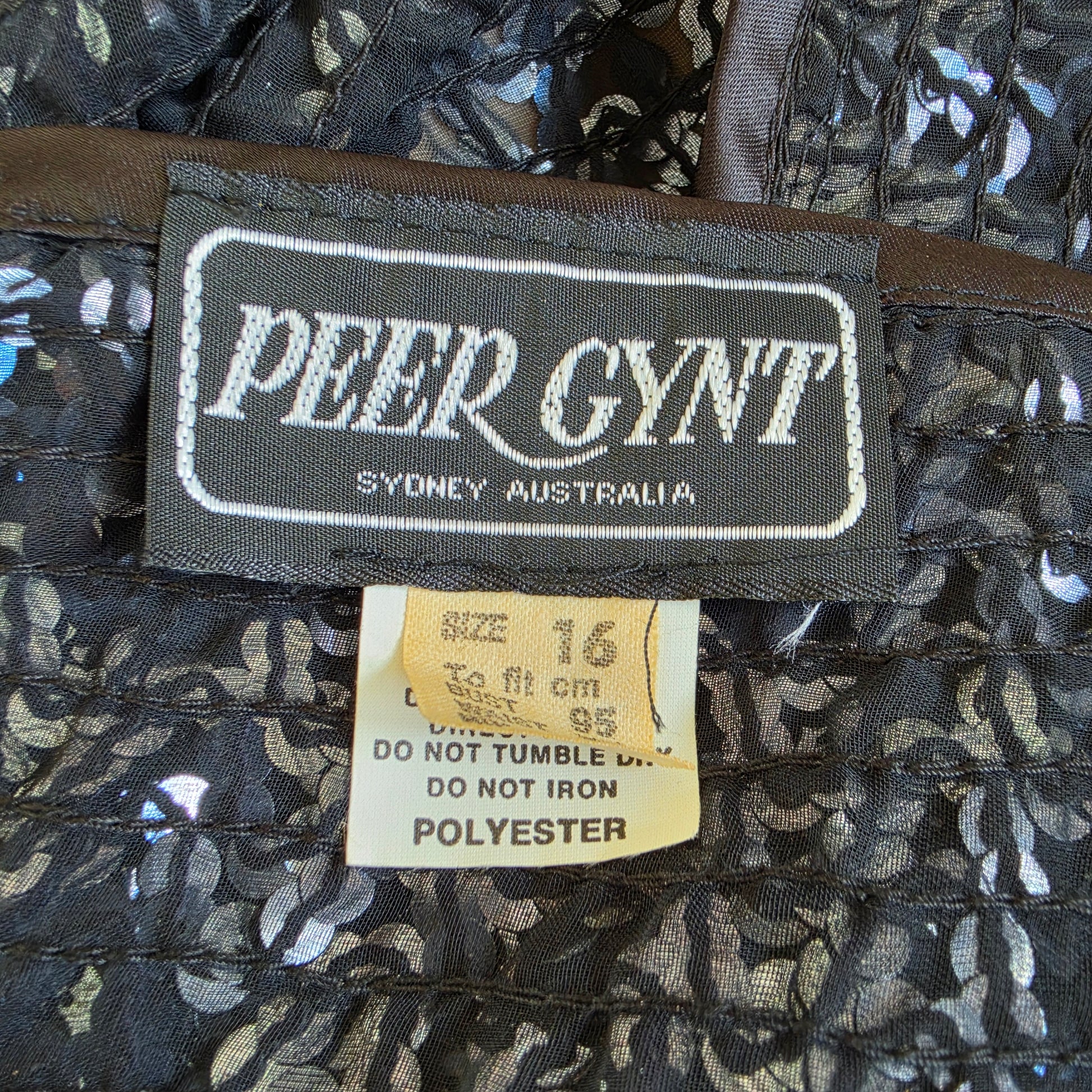 Peer Gynt vintage label inside sequin jacket showing brand details.