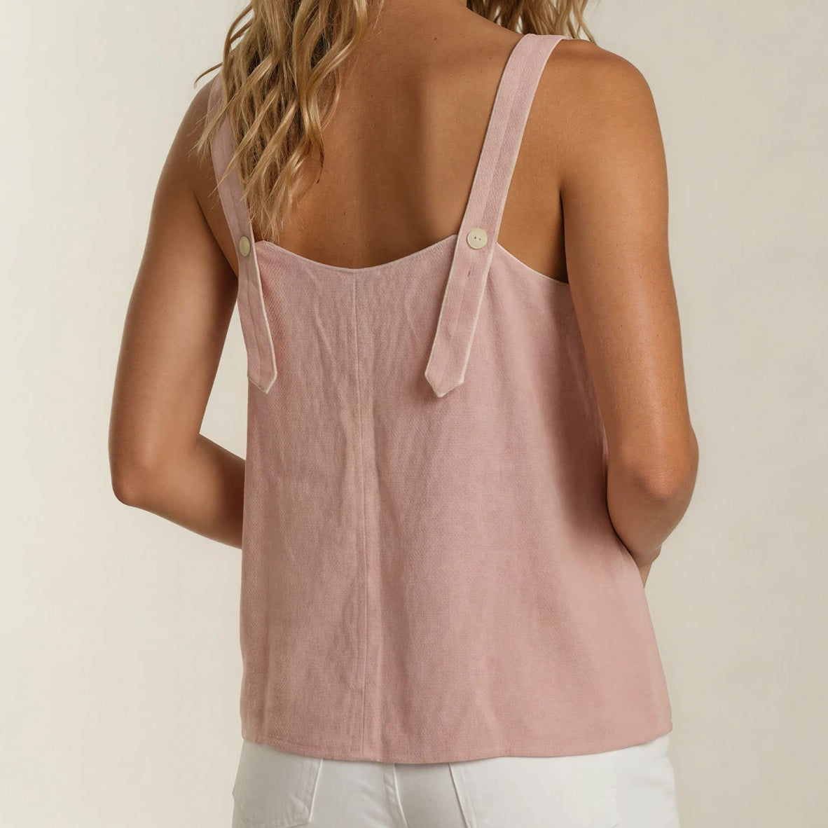 Rag and Bone Tia tank in blush pink with button detail and adjustable straps, back view.