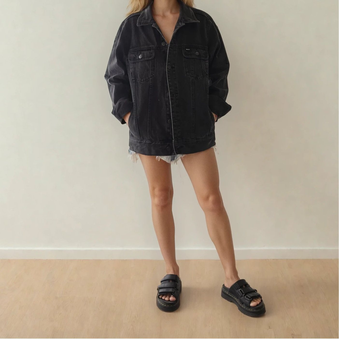 Black RVCA denim jacket worn oversized, faded wash with front button closure and chest pockets