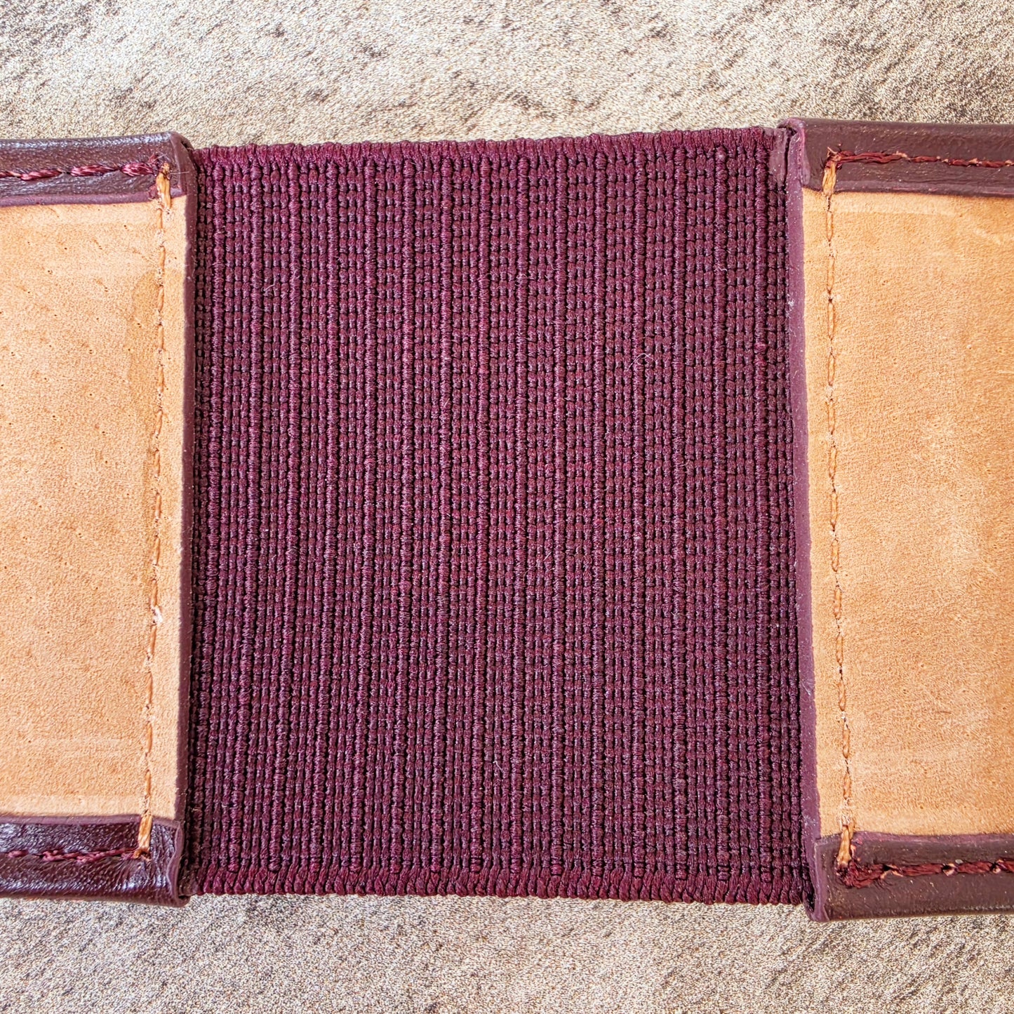 Back view of the inside of the Sass & Bide western style belt, showing the inside back stretch panel.