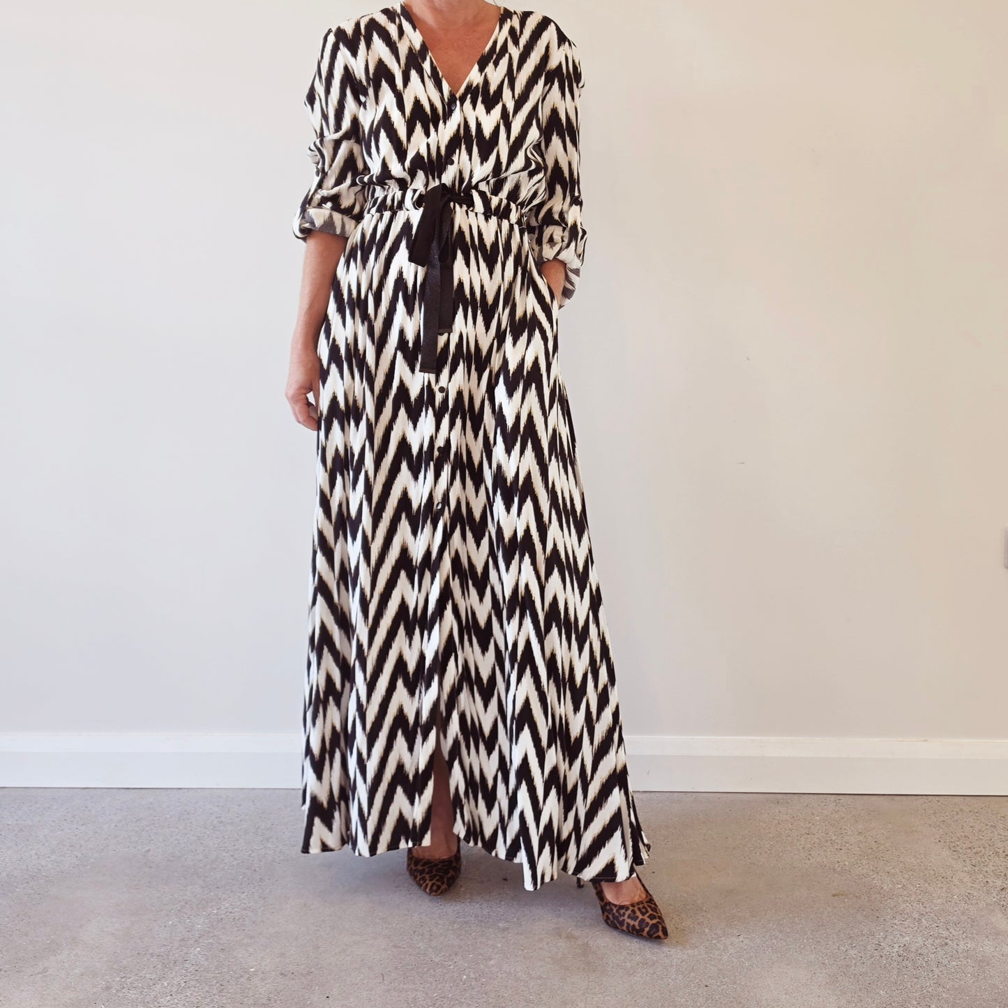 Sass & Bide Broken Chevron maxi dress in black and ivory with long sleeves, button front and waist tie.