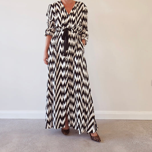Sass & Bide Broken Chevron maxi dress in black and ivory with long sleeves, button front and waist tie.