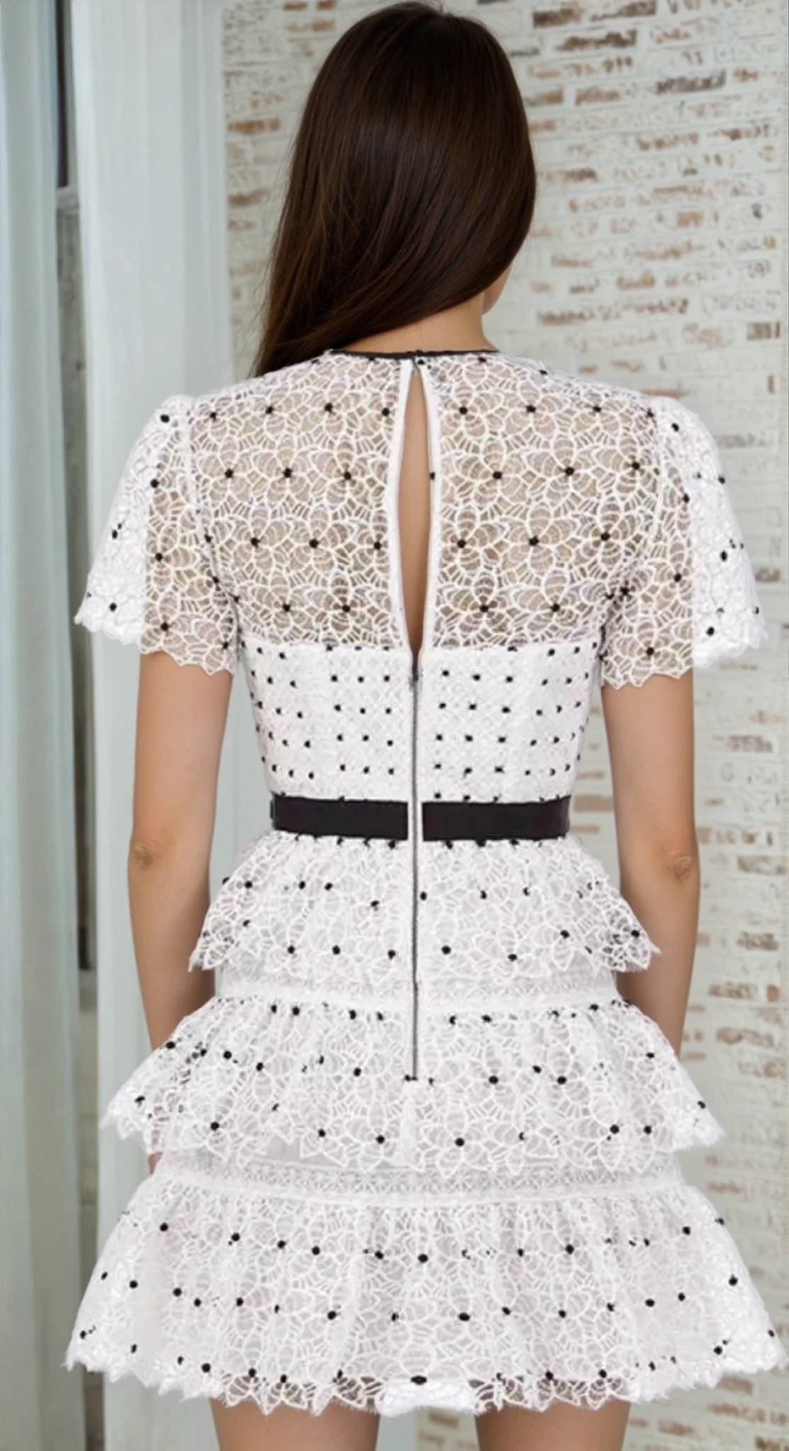 Back view of the Self Portrait Hibiscus Mini Dress with sheer lace, keyhole detail and exposed zip.