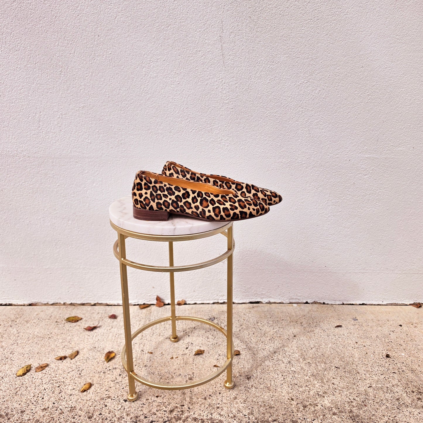 Side profile of Sézane Matilda leopard ballet flats with low heel