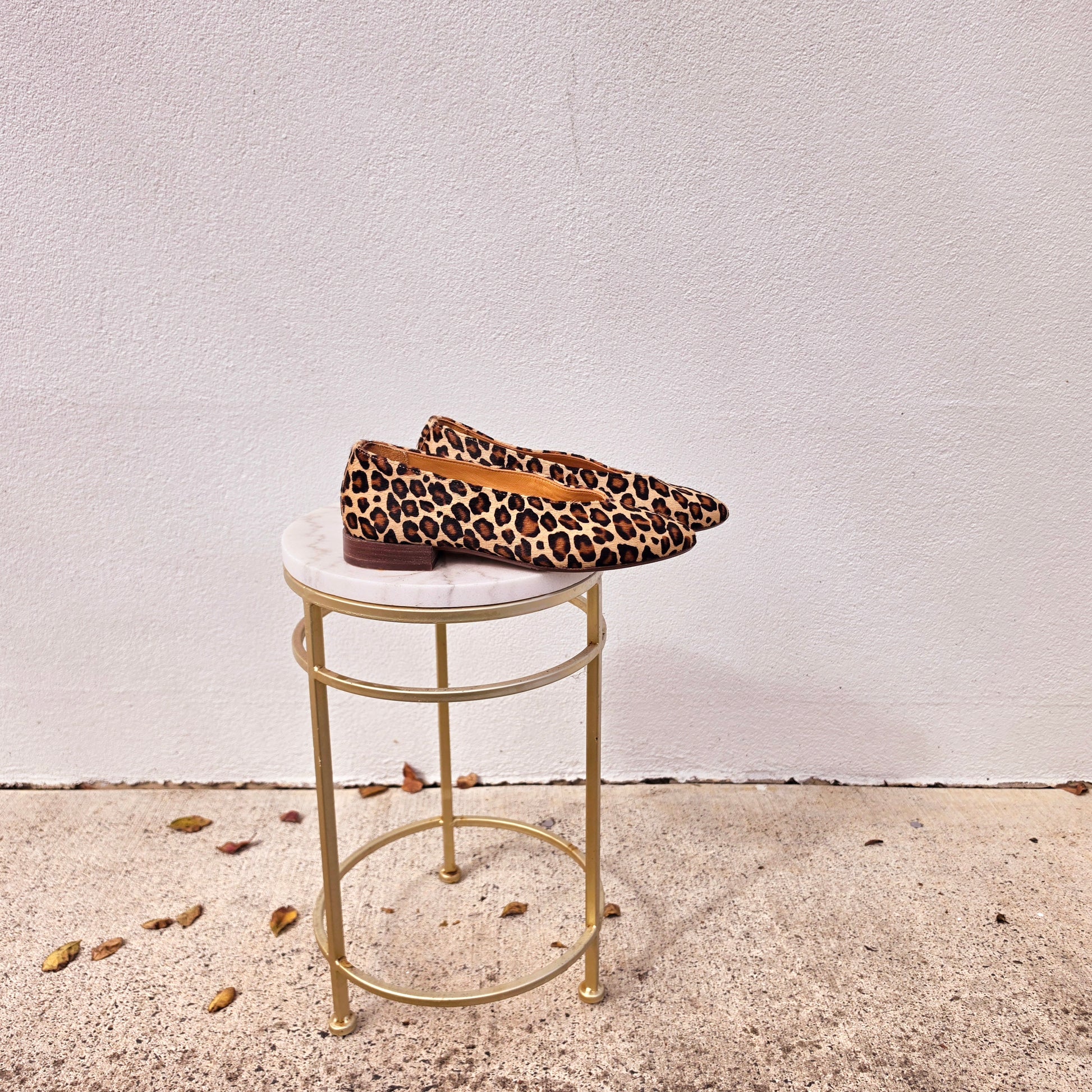 Side profile of Sézane Matilda leopard ballet flats with low heel