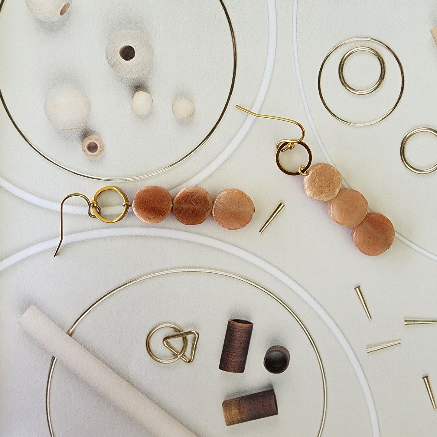 Sierra handmade gold-plated stone earrings in peachy tones, handmade by Wilson Avenue.