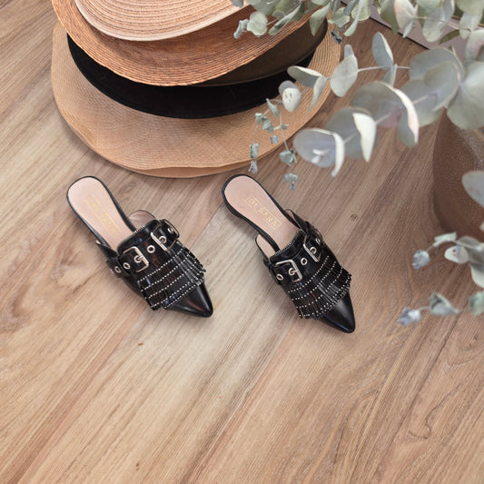 Top view of the Sol Sana Sadie fringe  and studded slides, showing the zip and buckle details.