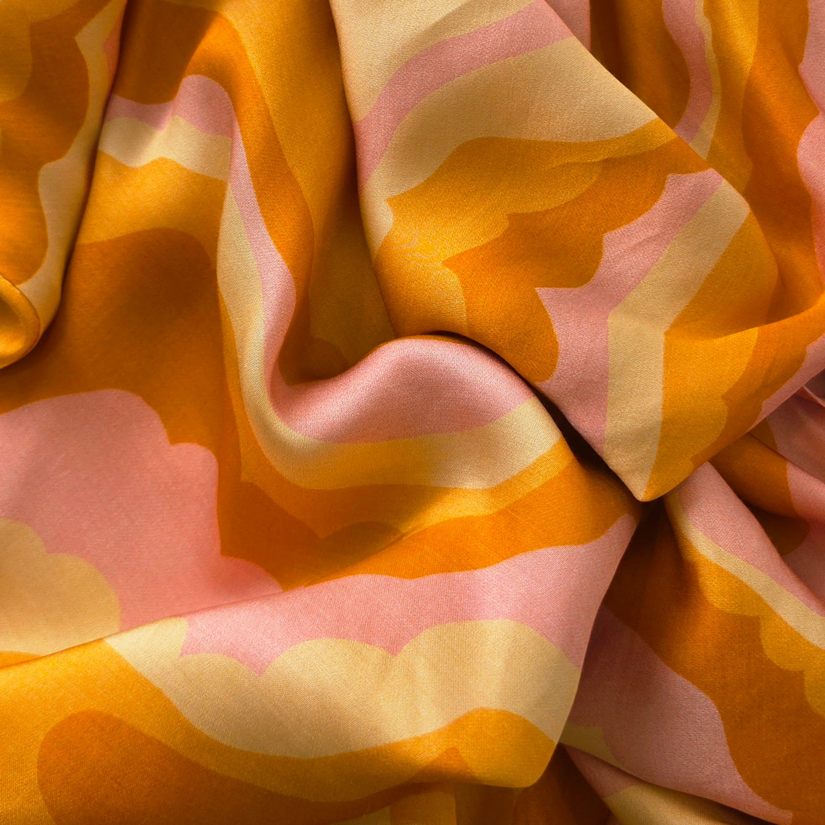 Close up of the retro swirl cloud print on the Suboo Cloud Keyhole slip dress.