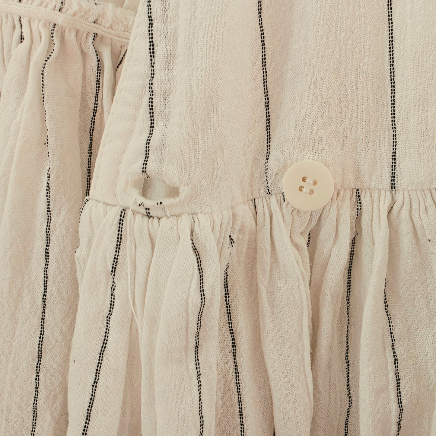 Image showing a close up view of the button closure on the vintage Country Road cotton midi dress in size 12