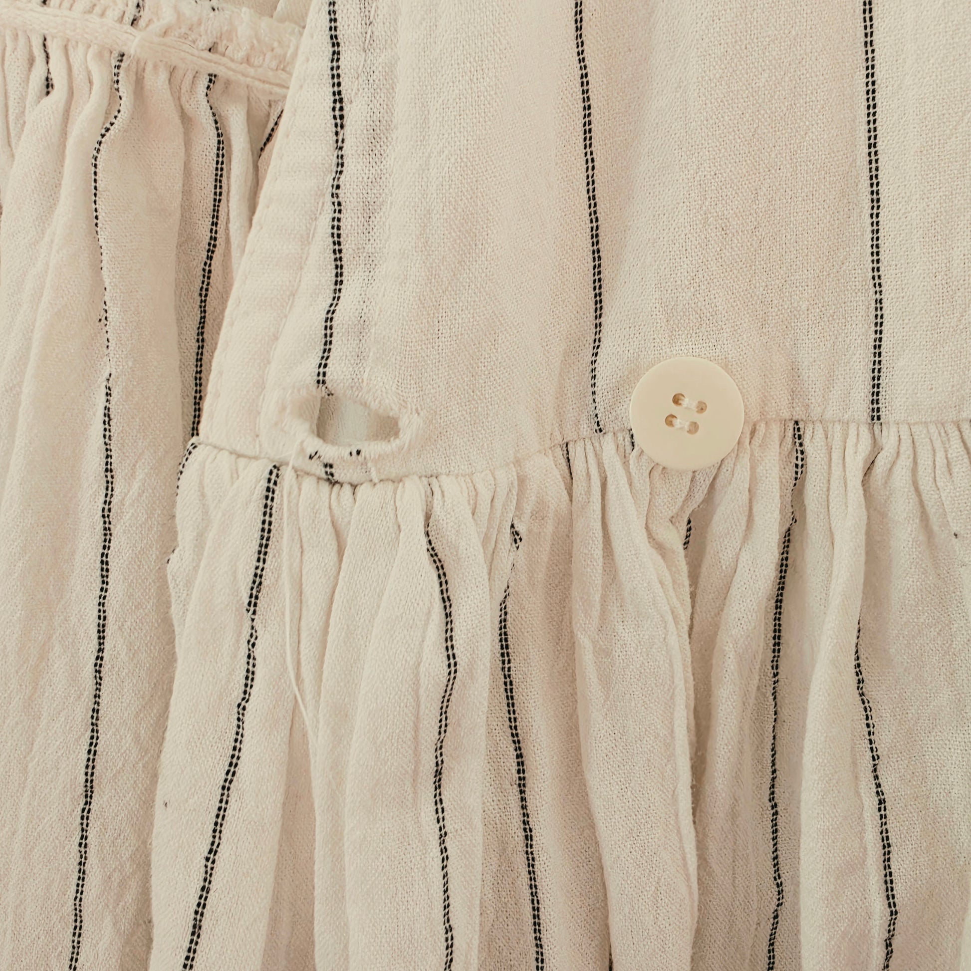 Image showing a close up view of the button closure on the vintage Country Road cotton midi dress in size 12