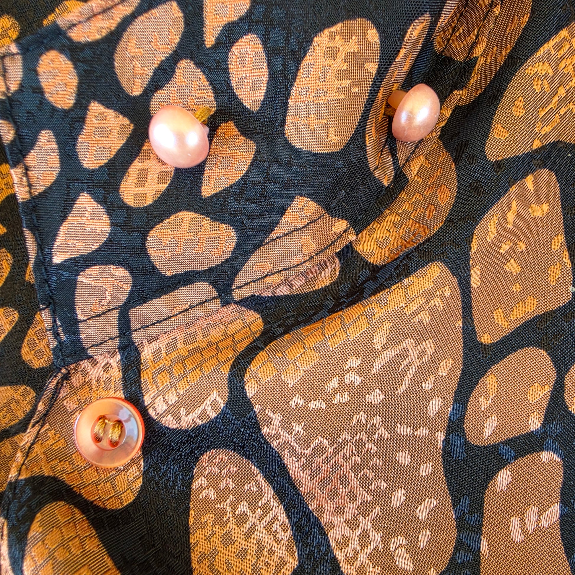 close up of the collar buttons on the Vintage Katies animal print blouse