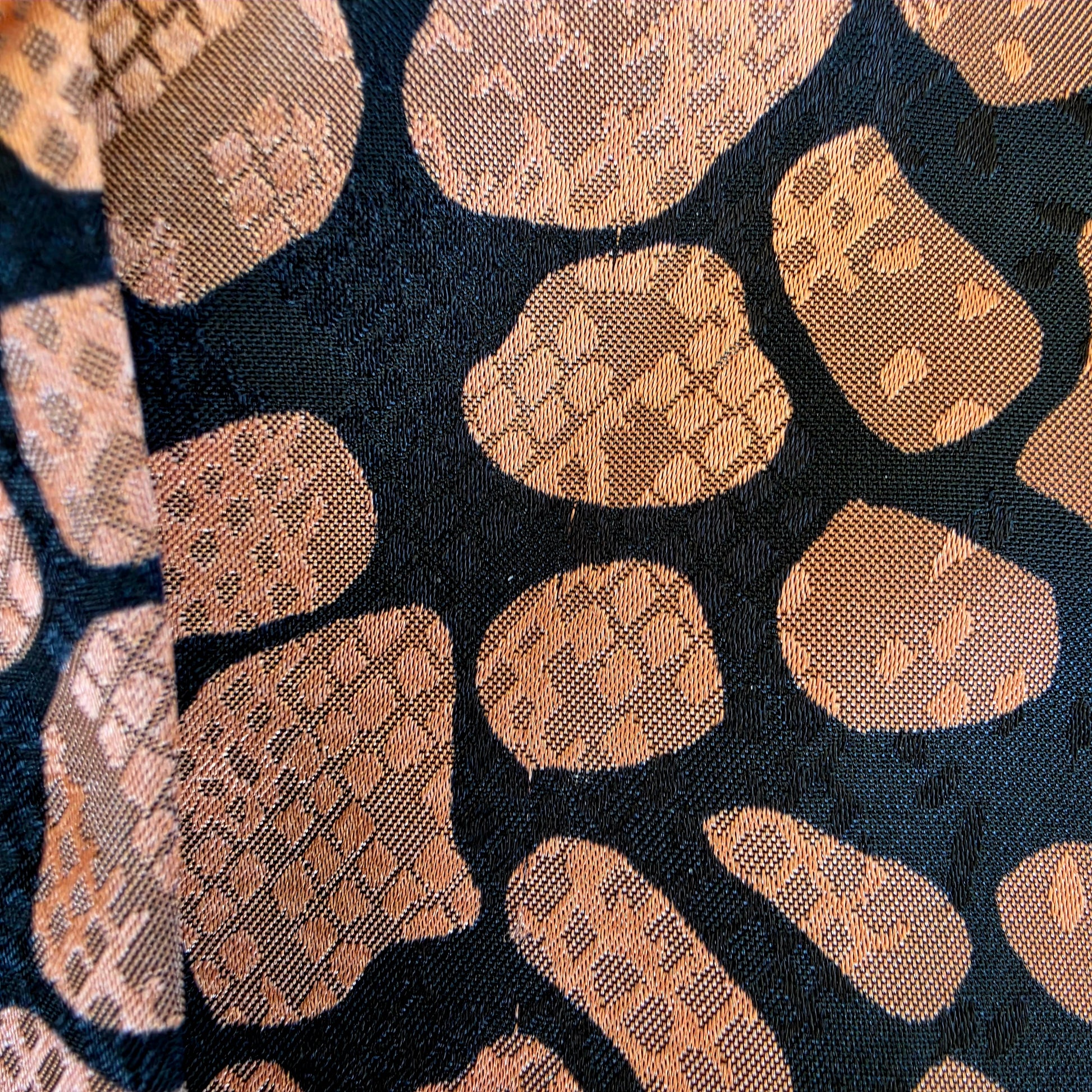 close up of the slight fabric pull on the Vintage Katies animal print blouse