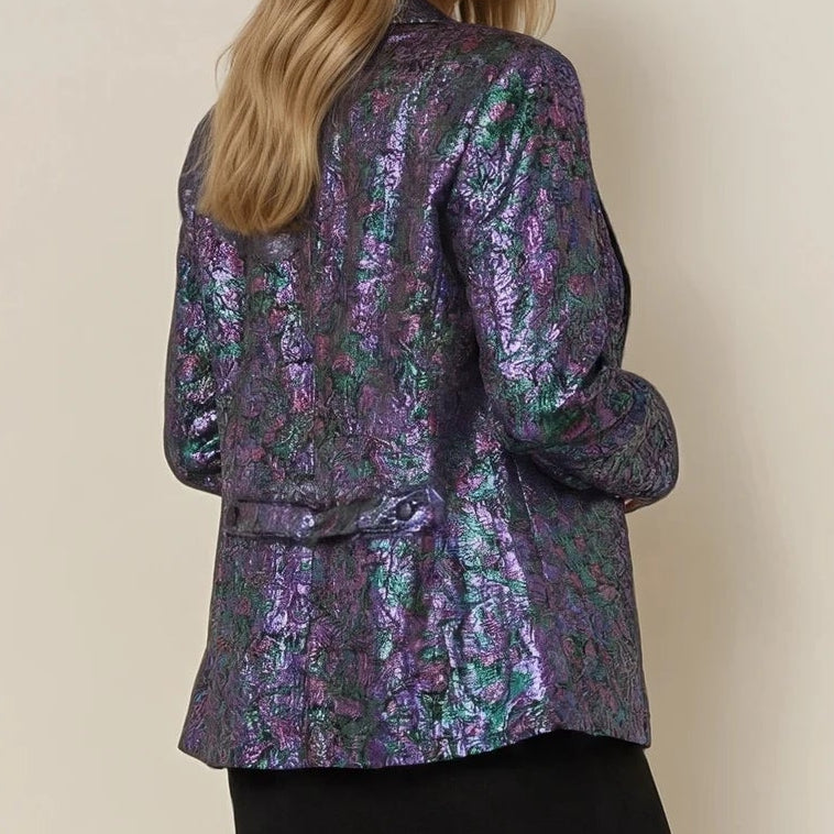 Model wearing the Vintage Liz Davenport blazer, showing the iridescent blue, purple and pink colours and the back button detail.