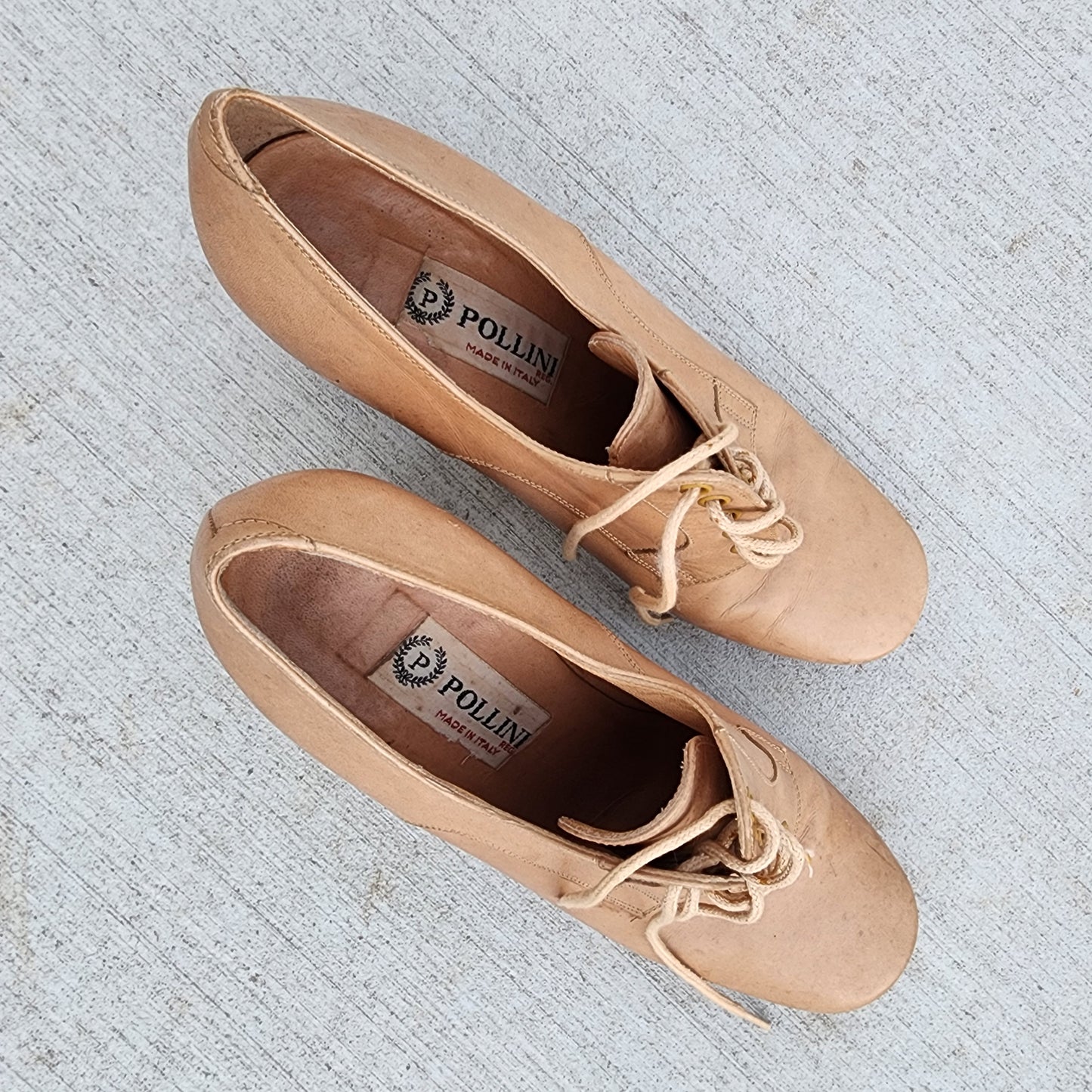 Top view of vintage Pollini lace-up oxfords displaying the round toe shape, laces, and stitching detail.