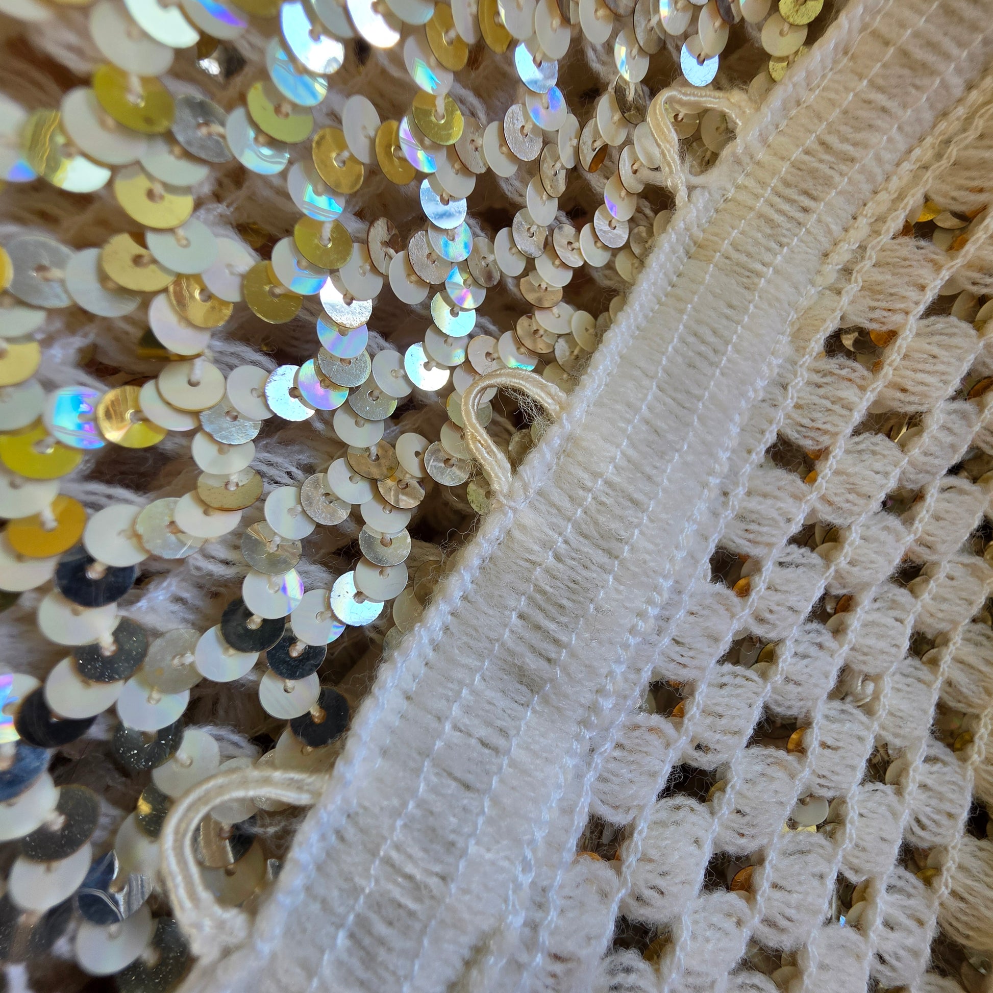 Close up view of some of the button loops showinging the fraying fabric